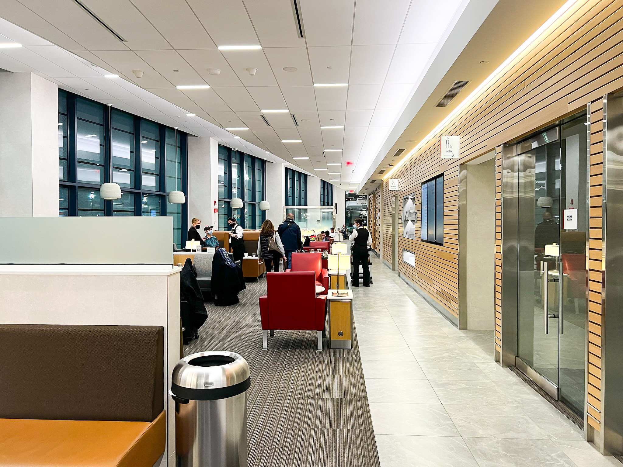 Sitting area and walkway at the Admirals Club at Boston Logan International Airport