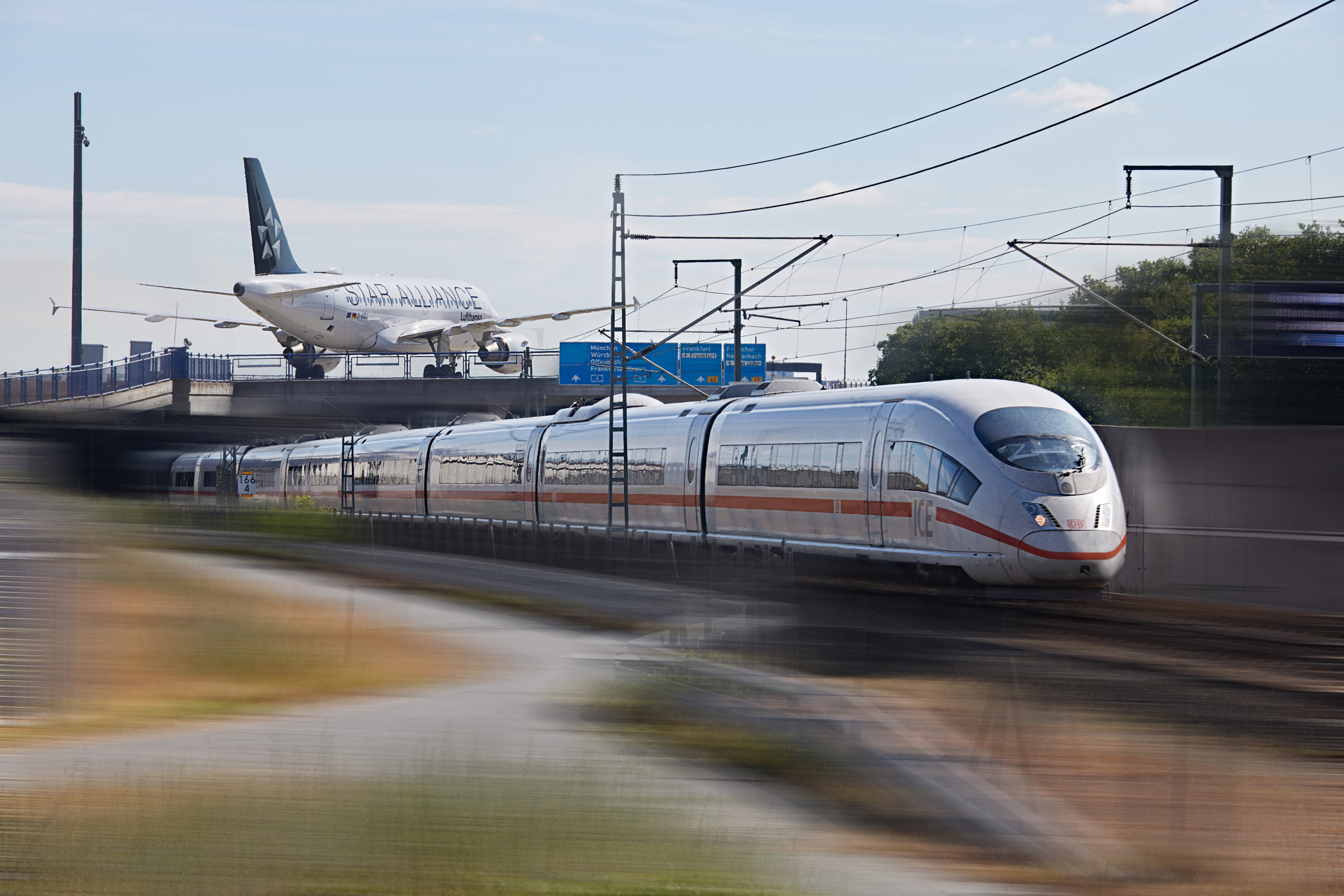 Deutsche Bahn train with Star Alliance plane Deutsche Bahn train with Star Alliance plane