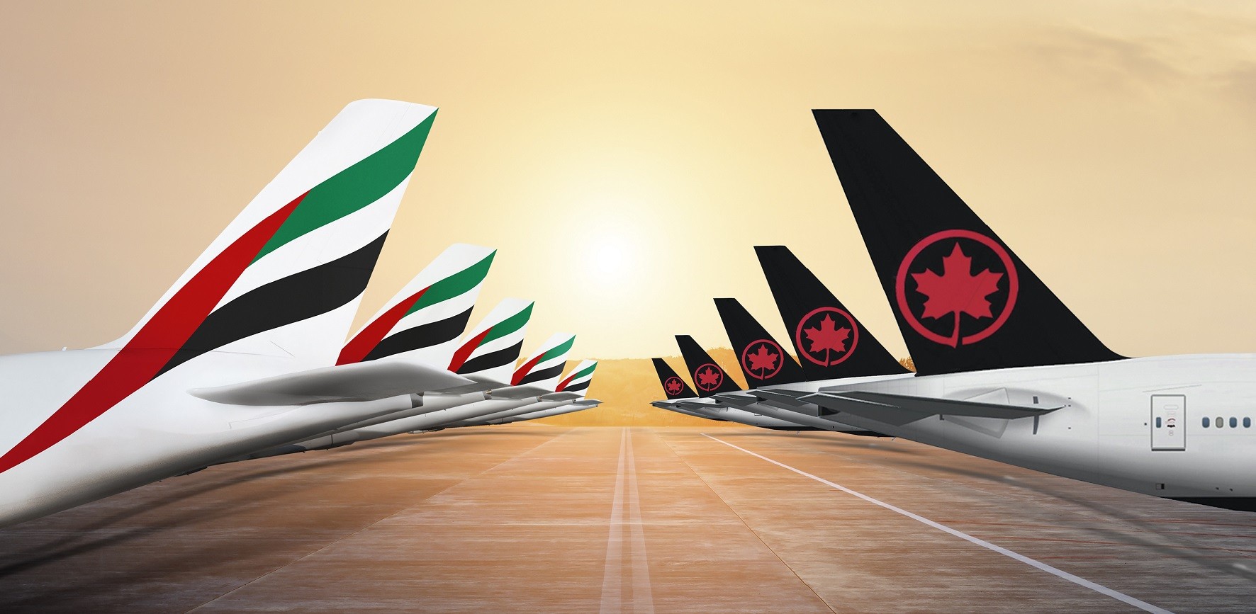 Emirates and Air Canada plane tails Emirates and Air Canada plane tails
