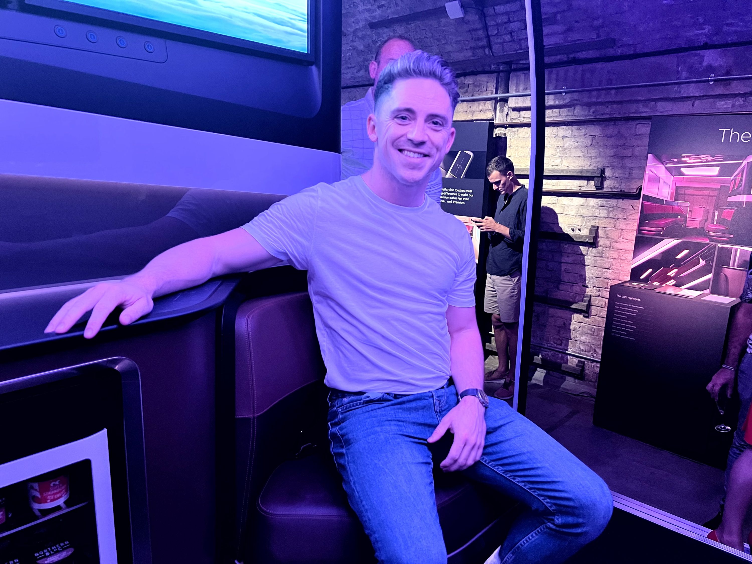 Daniel Ross enjoying a mock-up of The Loft of a Virgin A330neo