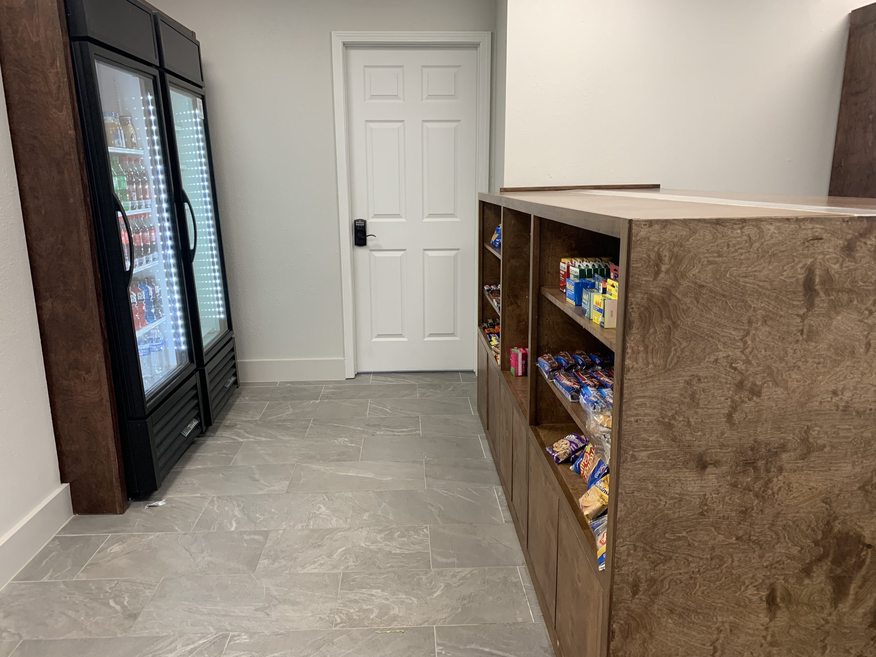 Cold drinks, snacks, and essentials in the lobby market at the DoubleTree by Hilton Corpus Christi Beachfront