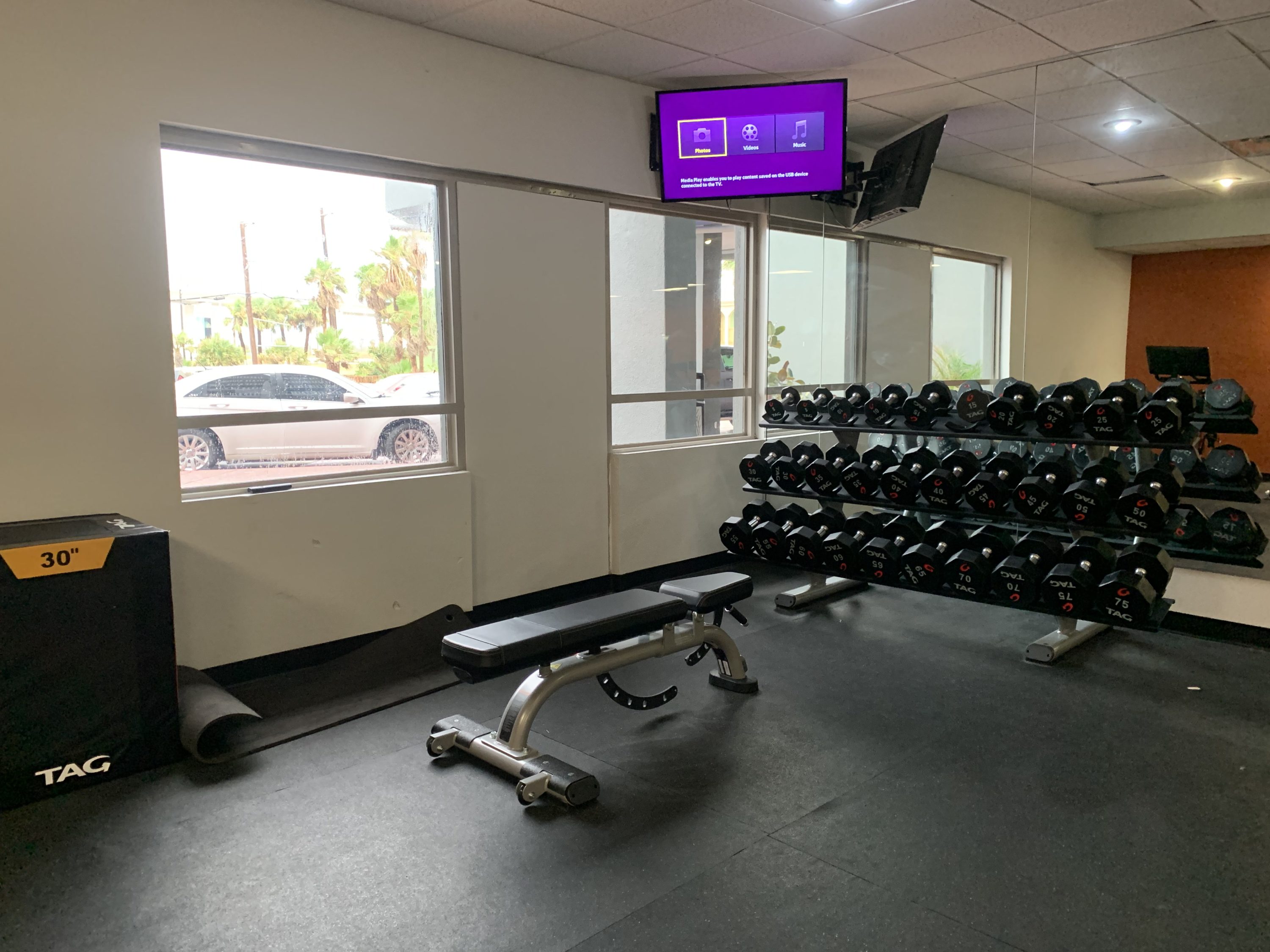 Free weights and a bench at the DoubleTree by Hilton Corpus Christi Beachfront