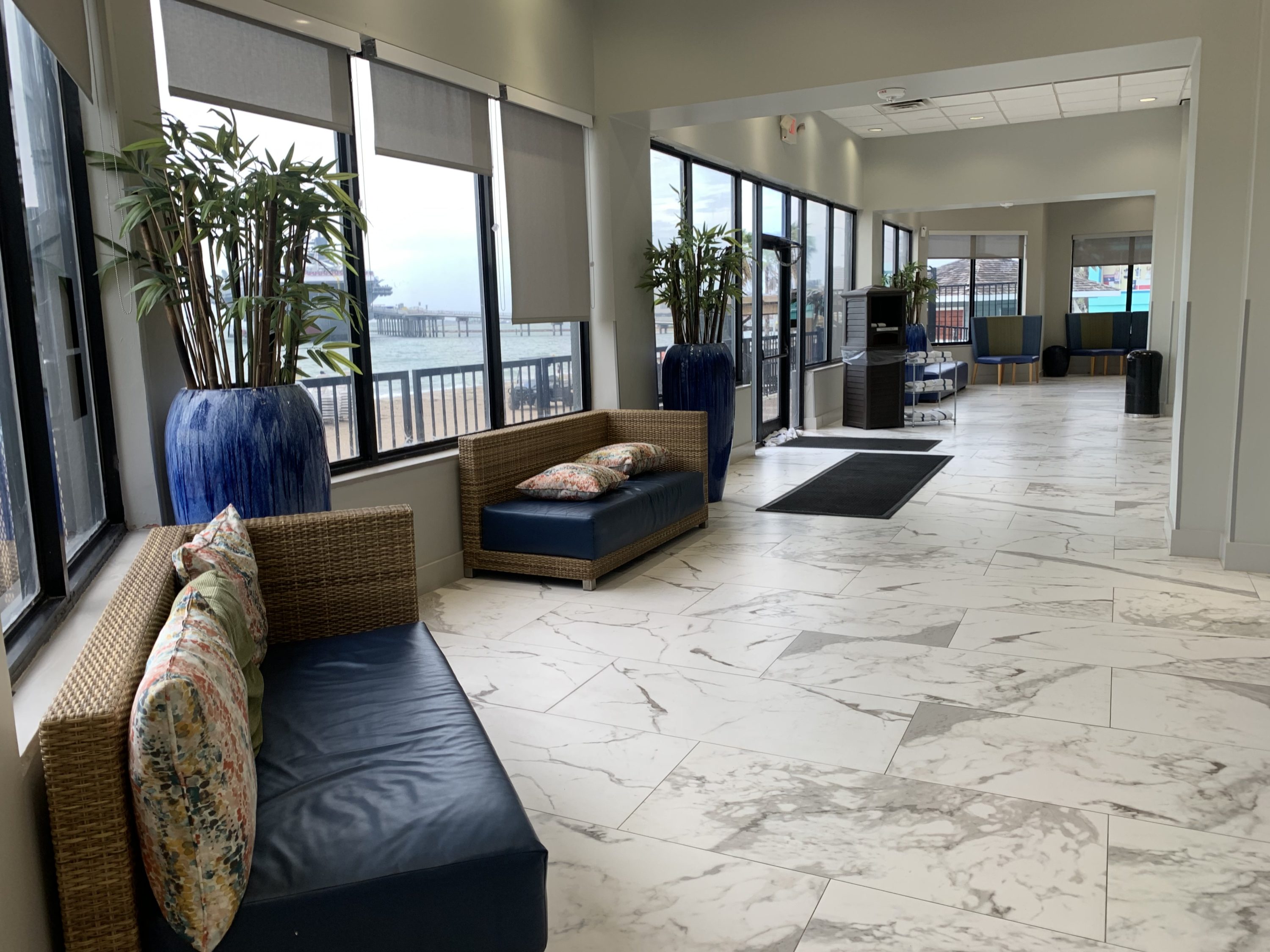 Corridor to the pool and towels at DoubleTree by Hilton Corpus Christi Beachfront