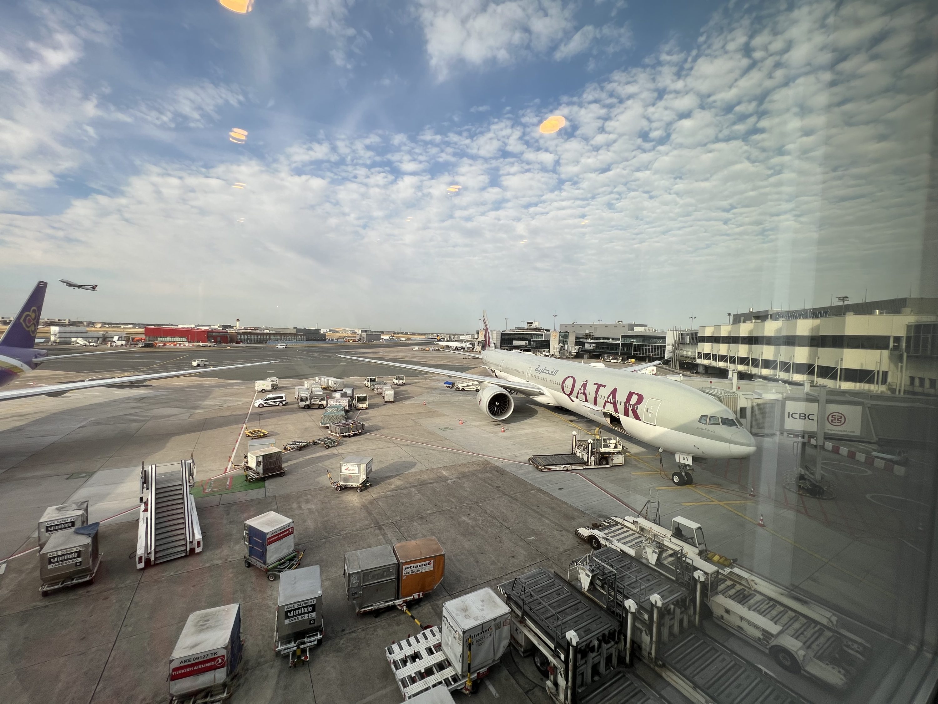Qatar Airways plane view at the Lufthansa Senator lounge.