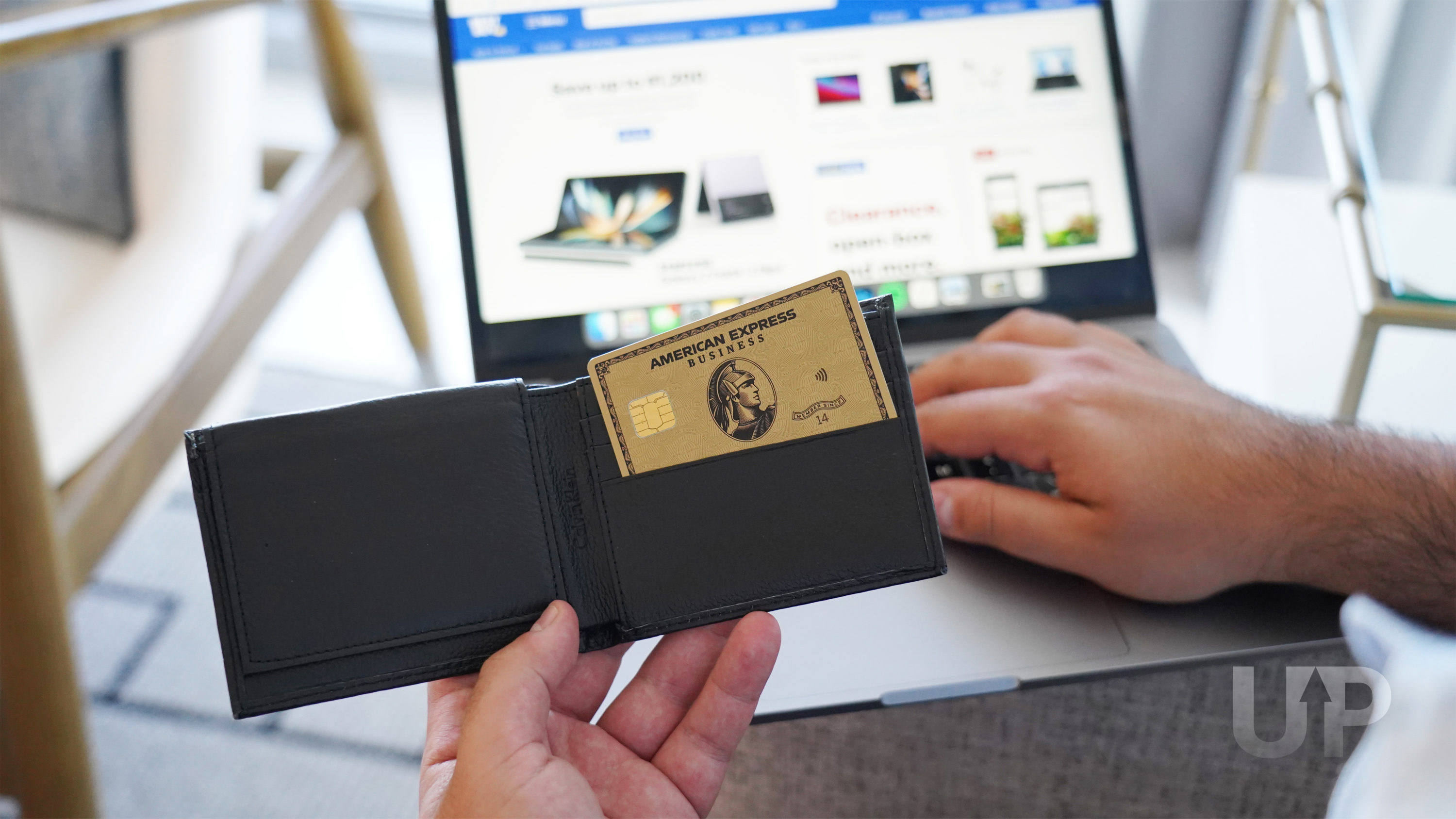 Small business owner at home office Amex Business Gold Upgraded Points LLC 1 large