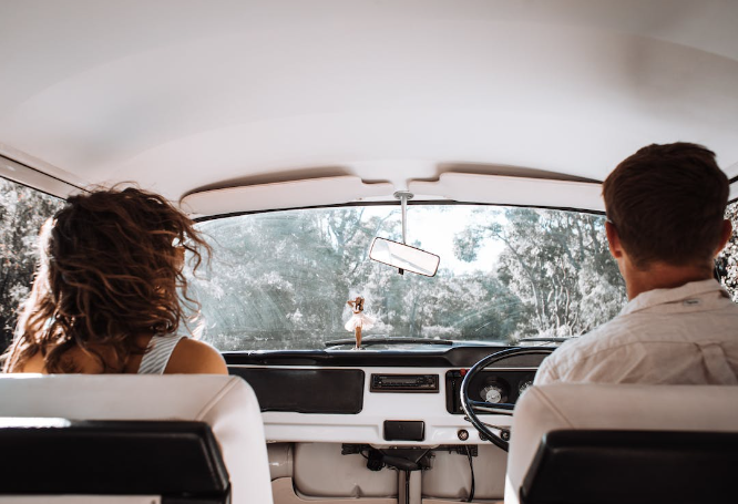 Couple driving in car