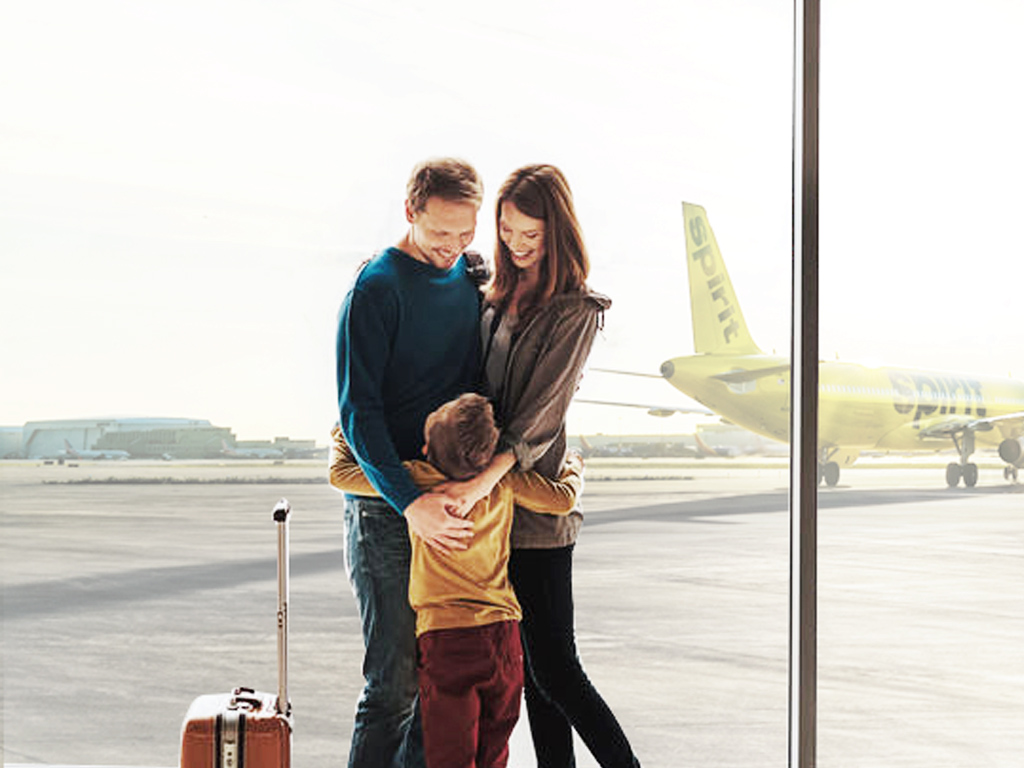Spirit Aircraft Tails Family at airport in front of Spirit plane