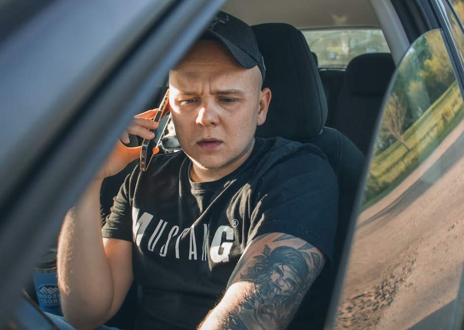 Man making emergency phone call Man making emergency phone call