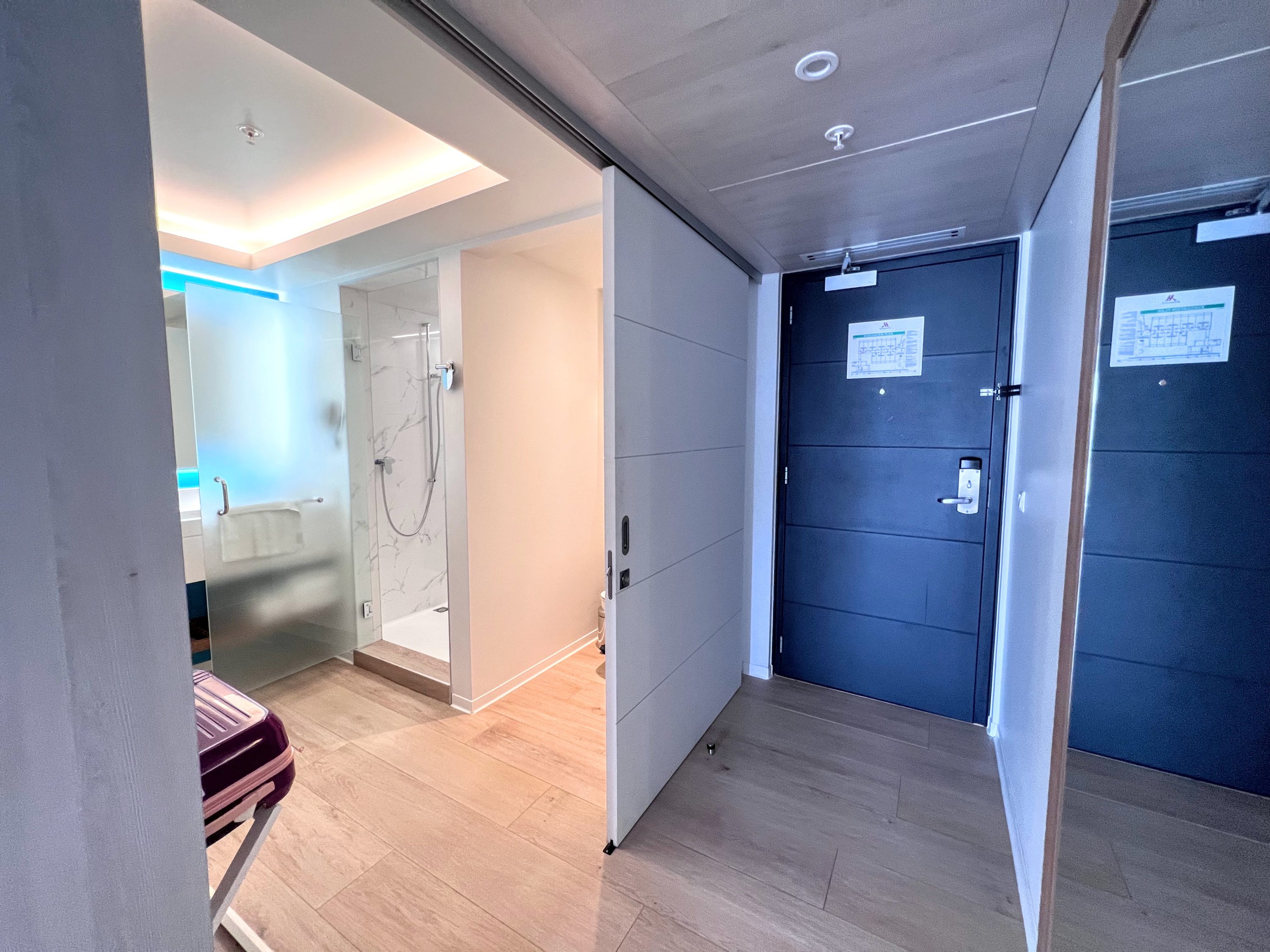 Curacao Marriott Beach Resort guestroom door and bathroom
