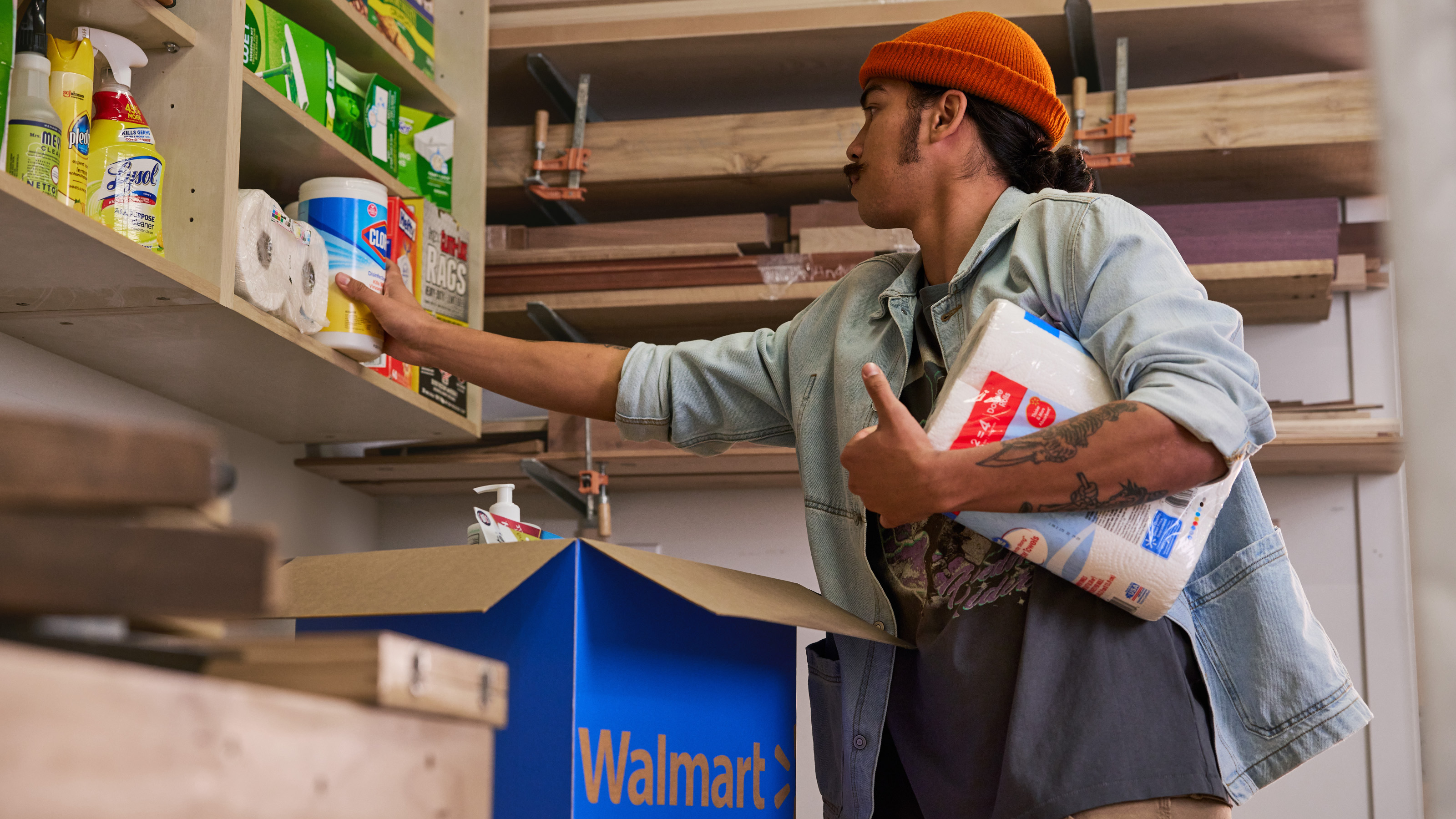 Customer stocking pantry with Walmart items