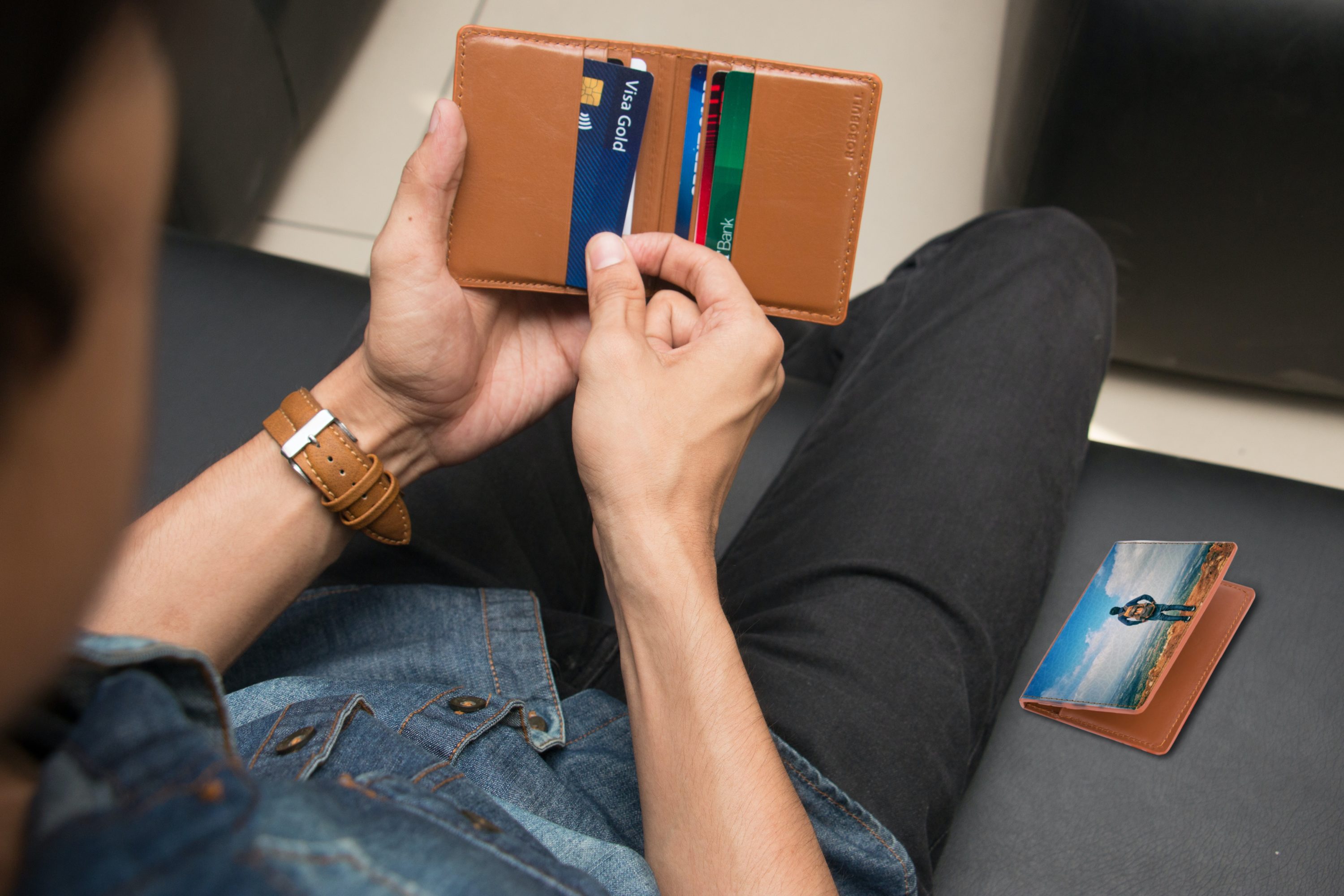 Man holding wallet with credit cards