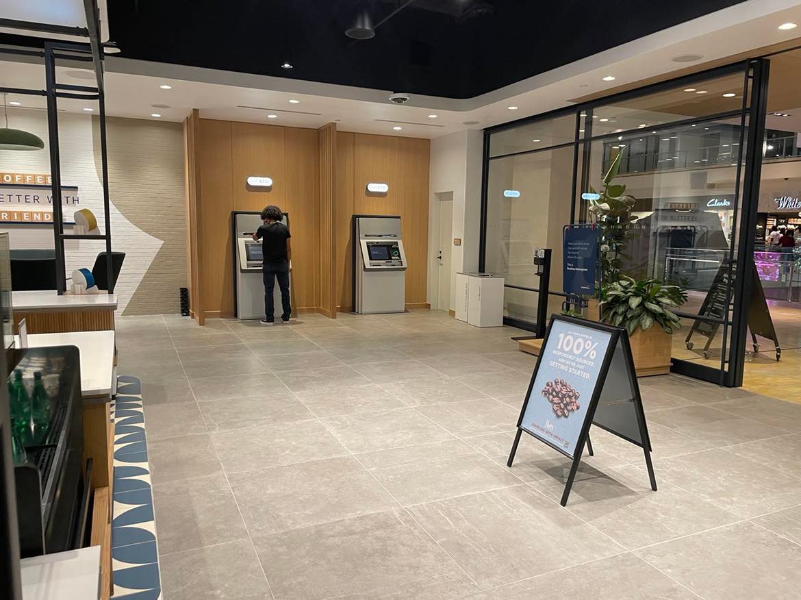 ATMs at the entrance of the Houston Galleria Capital One Café
