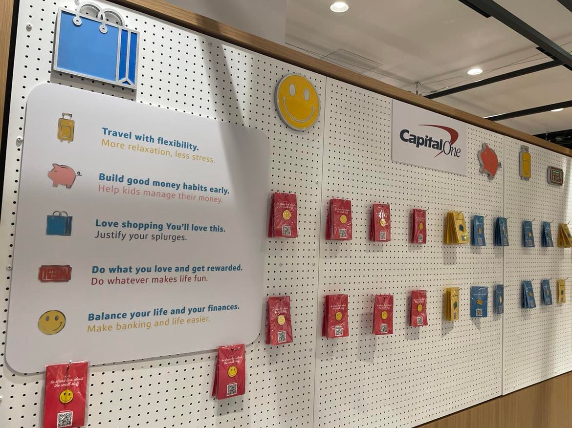 Free product information pins at the Houston Galleria Capital One Café