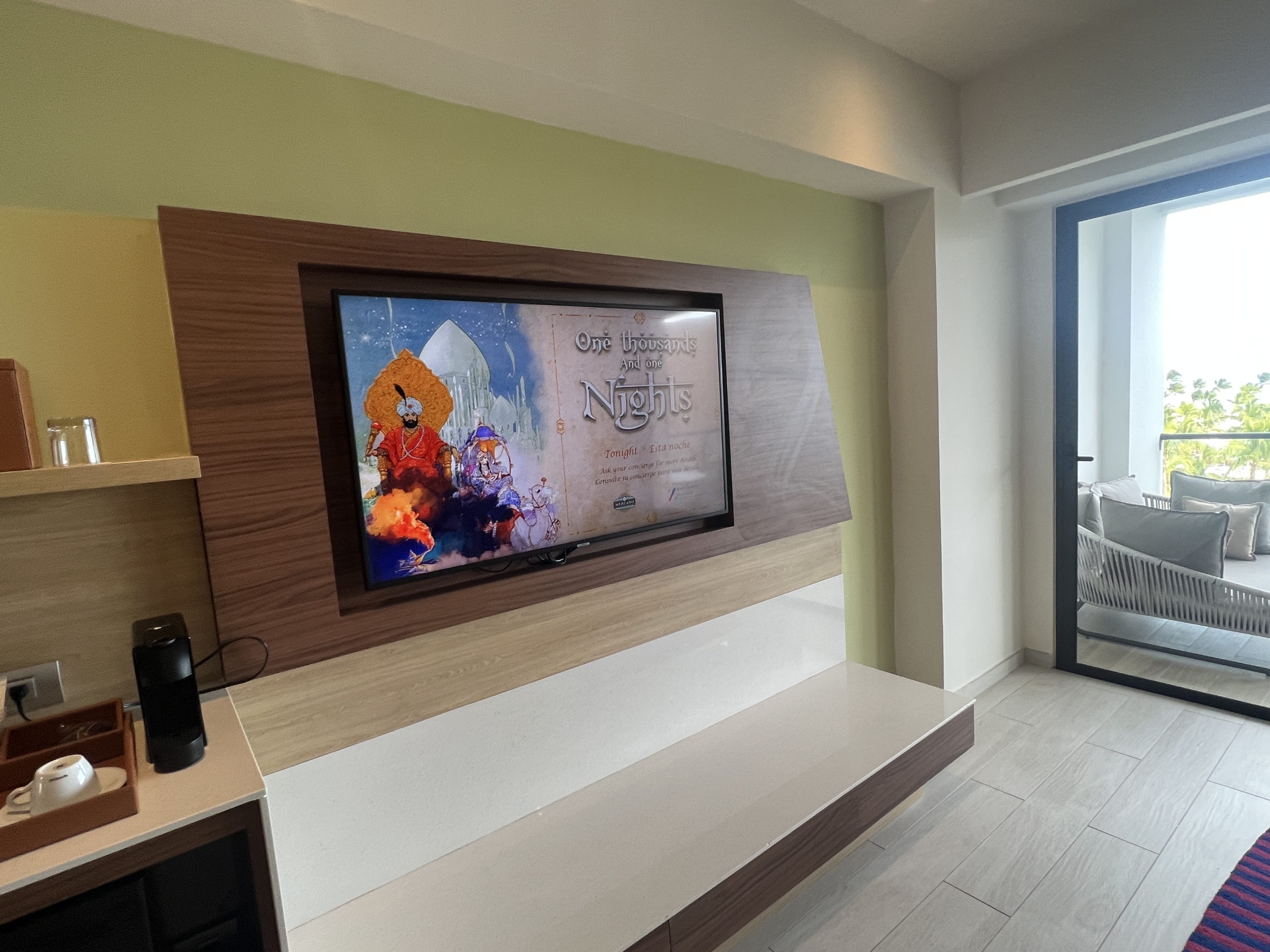 Hyatt Ziva Cap Cana Living room TV and minifridge with snacks.