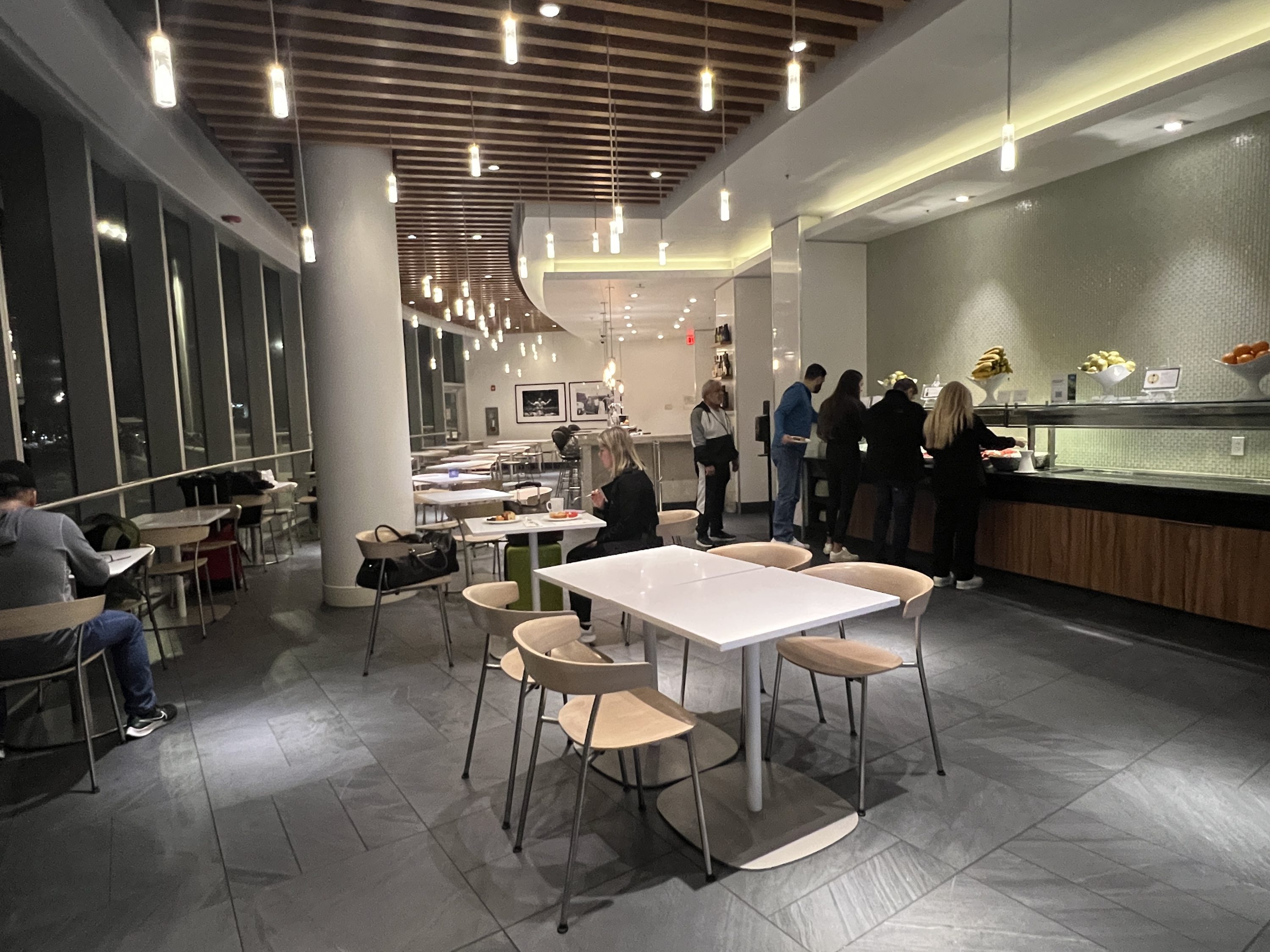 MIA Centurion Lounge amenities, including complimentary food and drinks. 