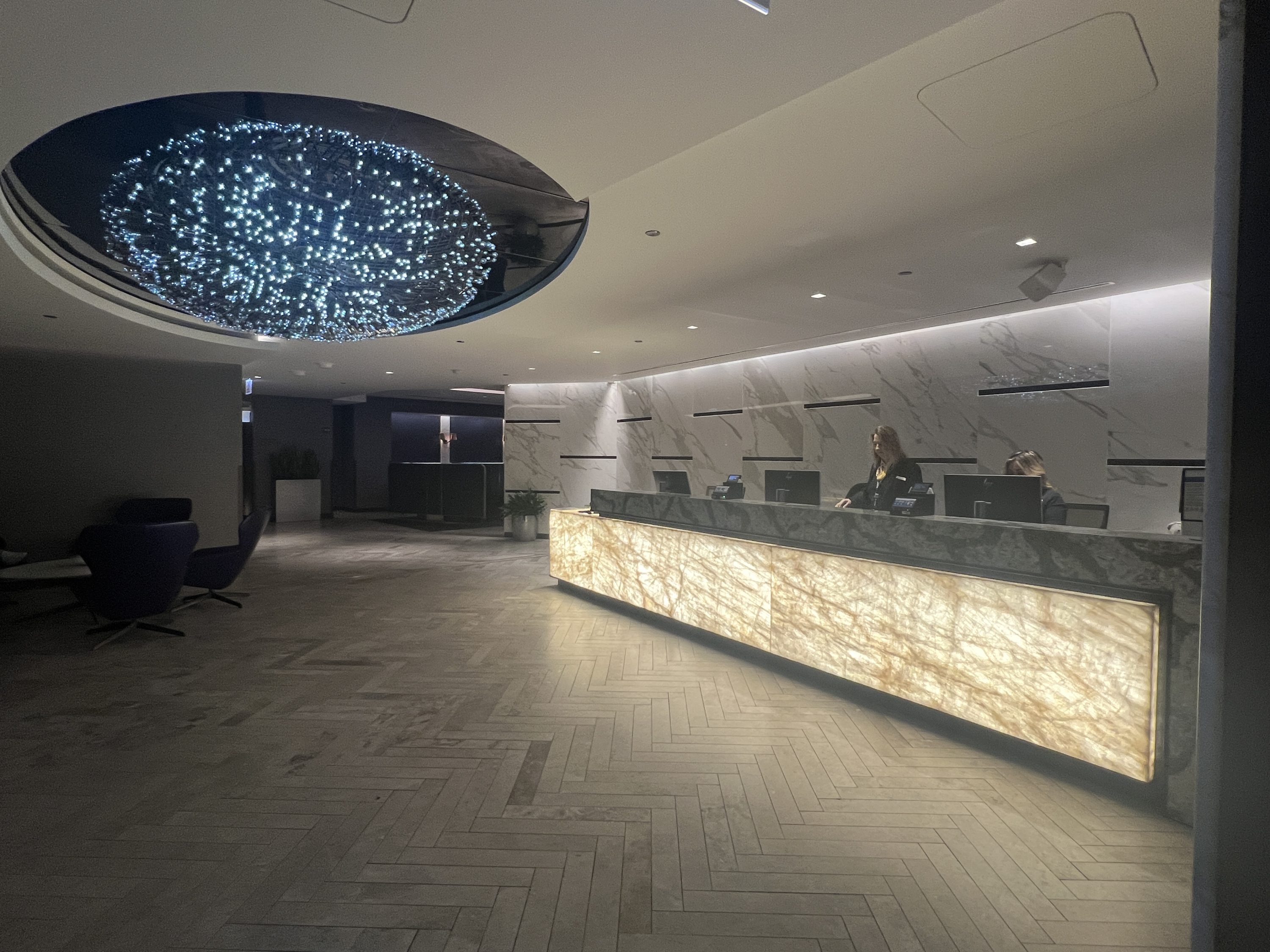 United Polaris Lounge ORD reception desk.