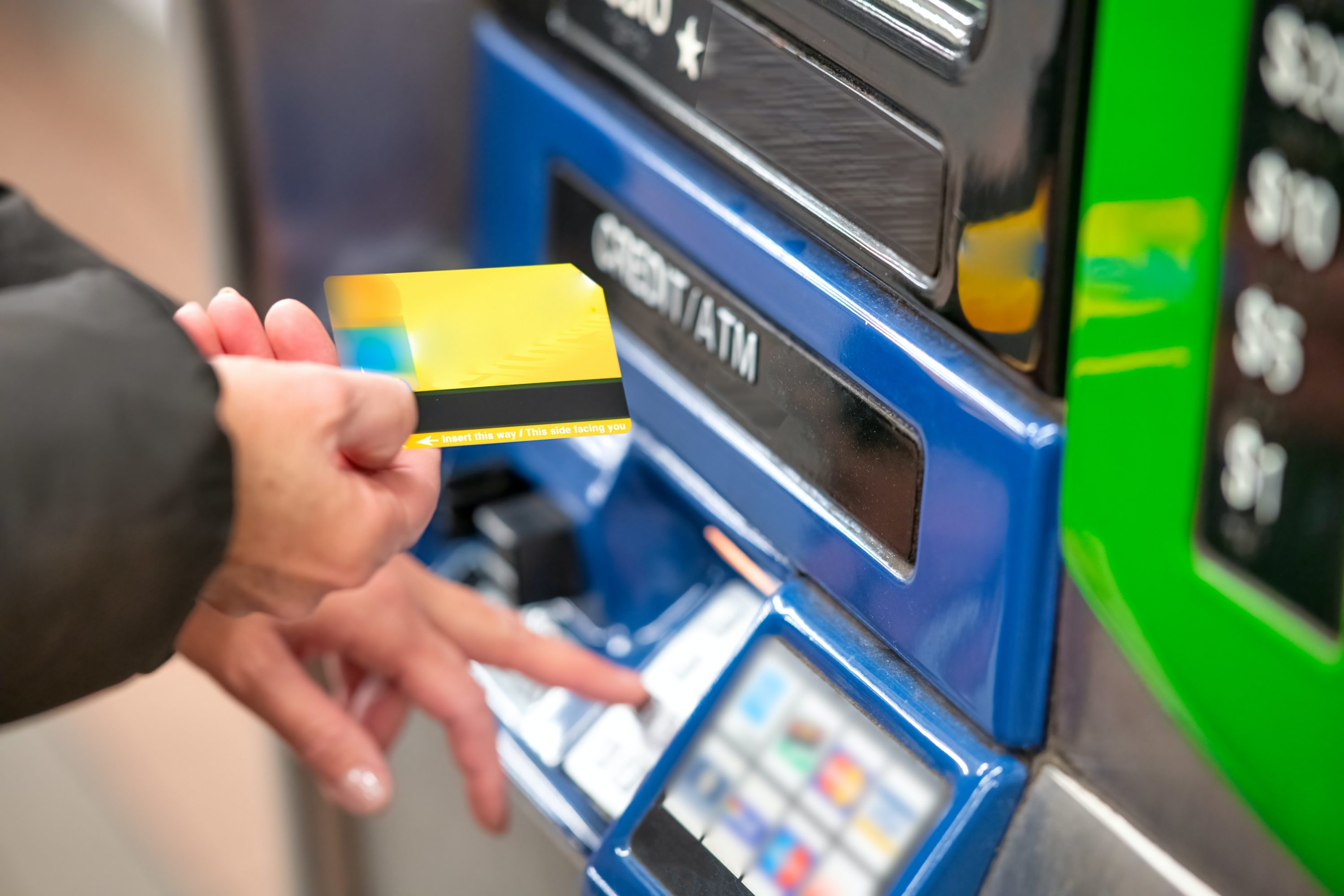 Person Using ATM Person Using ATM