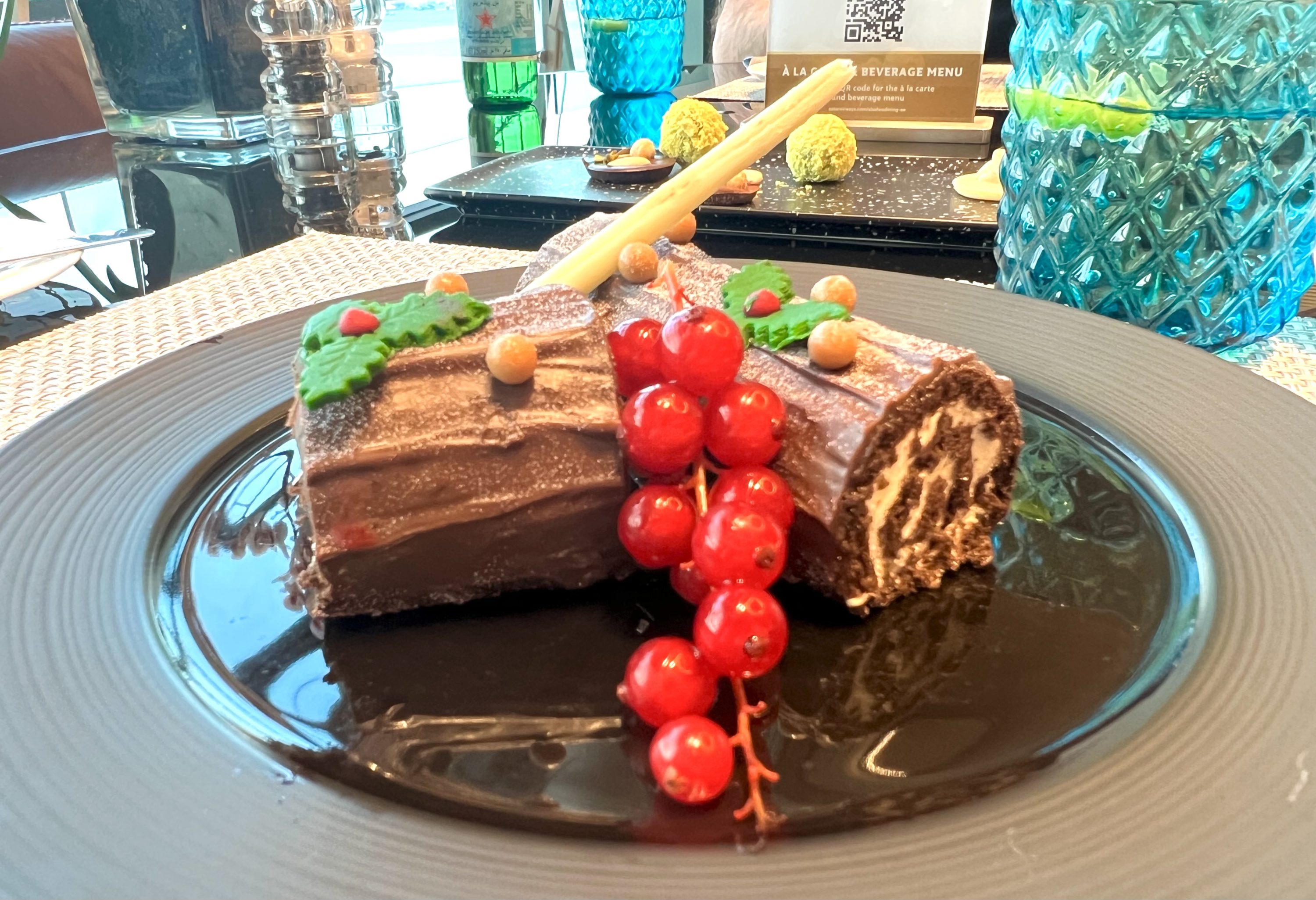 Qatar Airways Airbus A380 first class Al Safwa Lounge Yule log