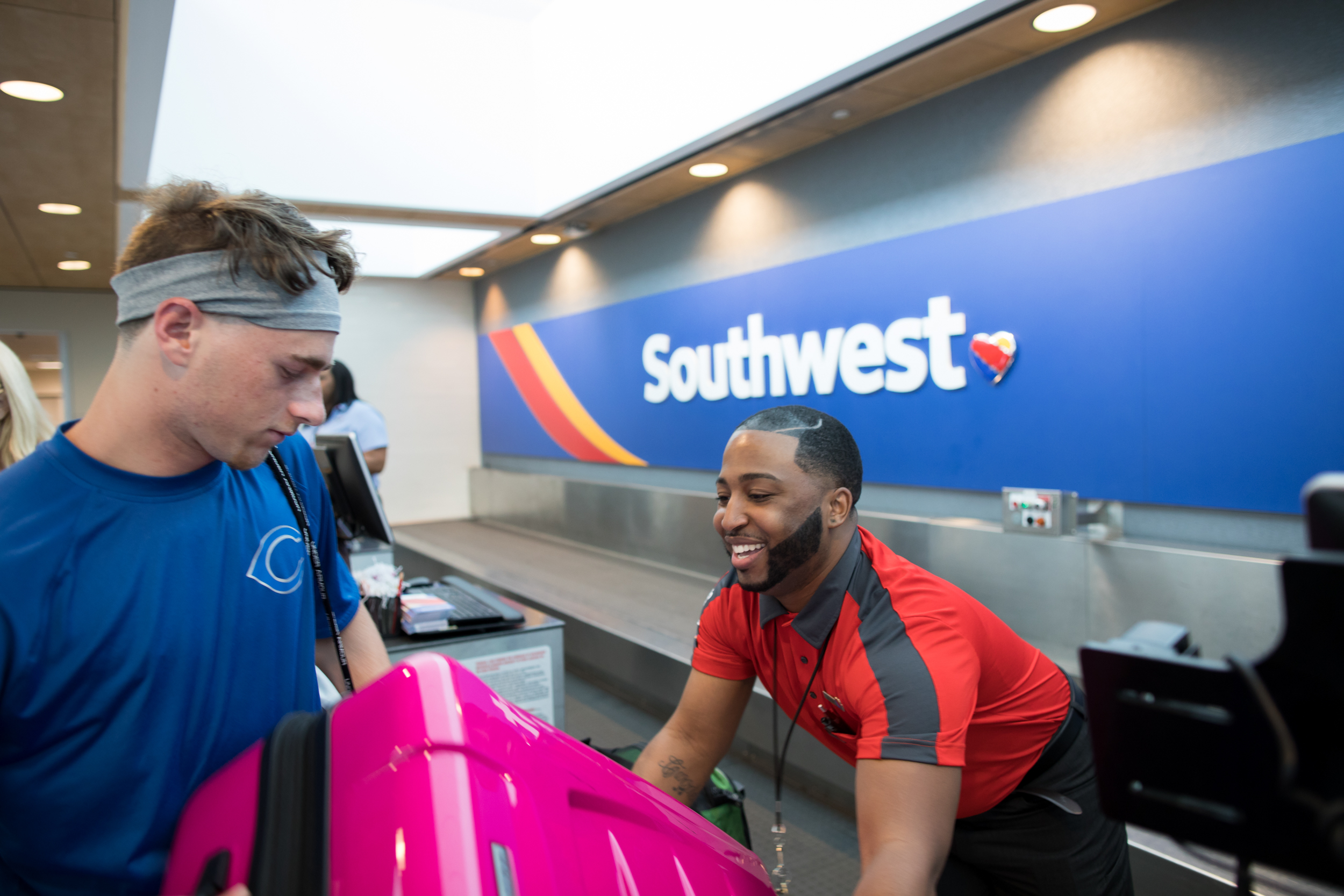Southwest passenger checking in bag Southwest passenger checking in bag