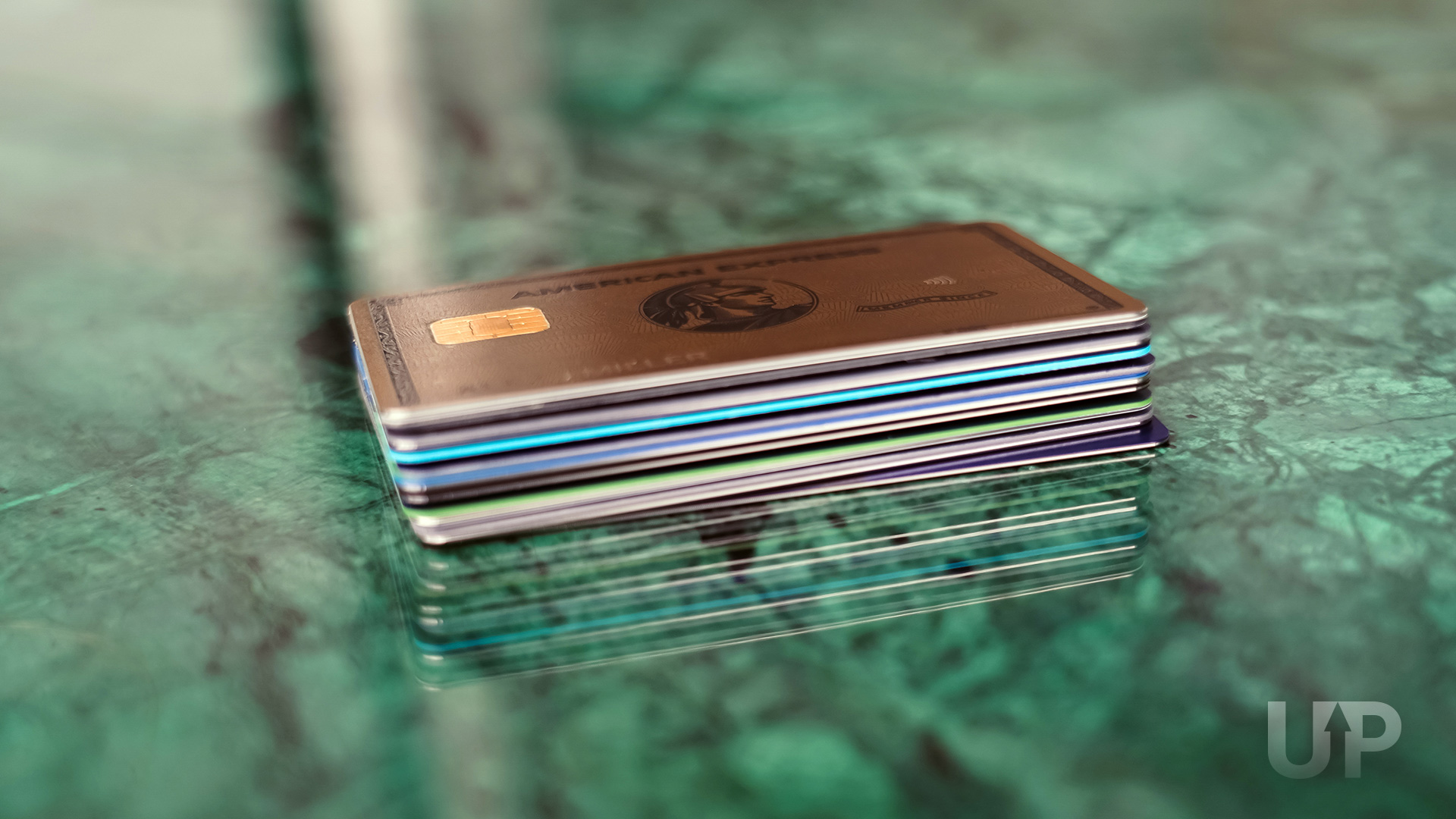 Stack of Credit Cards on Table Upgraded Points LLC Stack of Credit Cards on Table Upgraded Points LLC