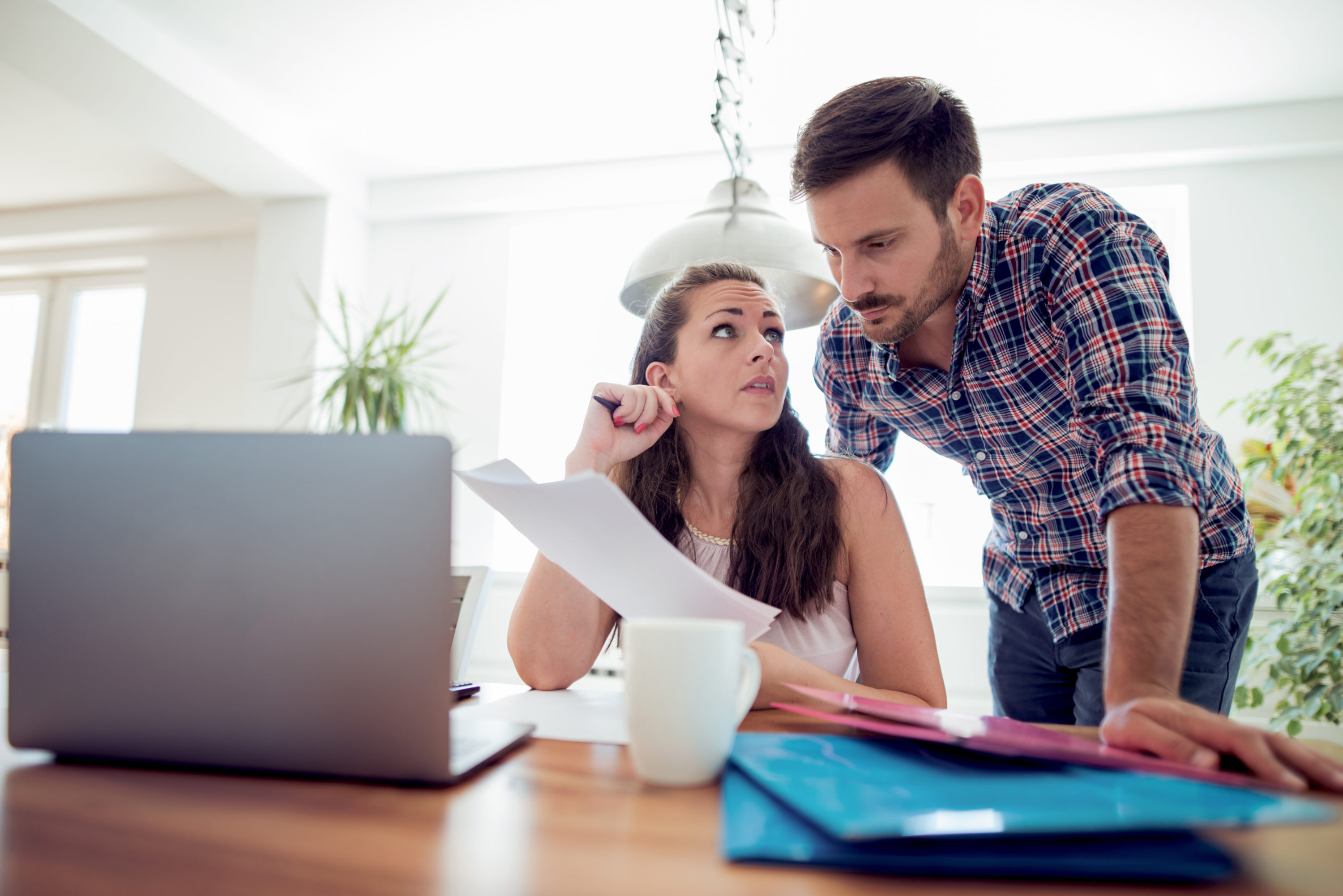 Couple discussing credit card bills