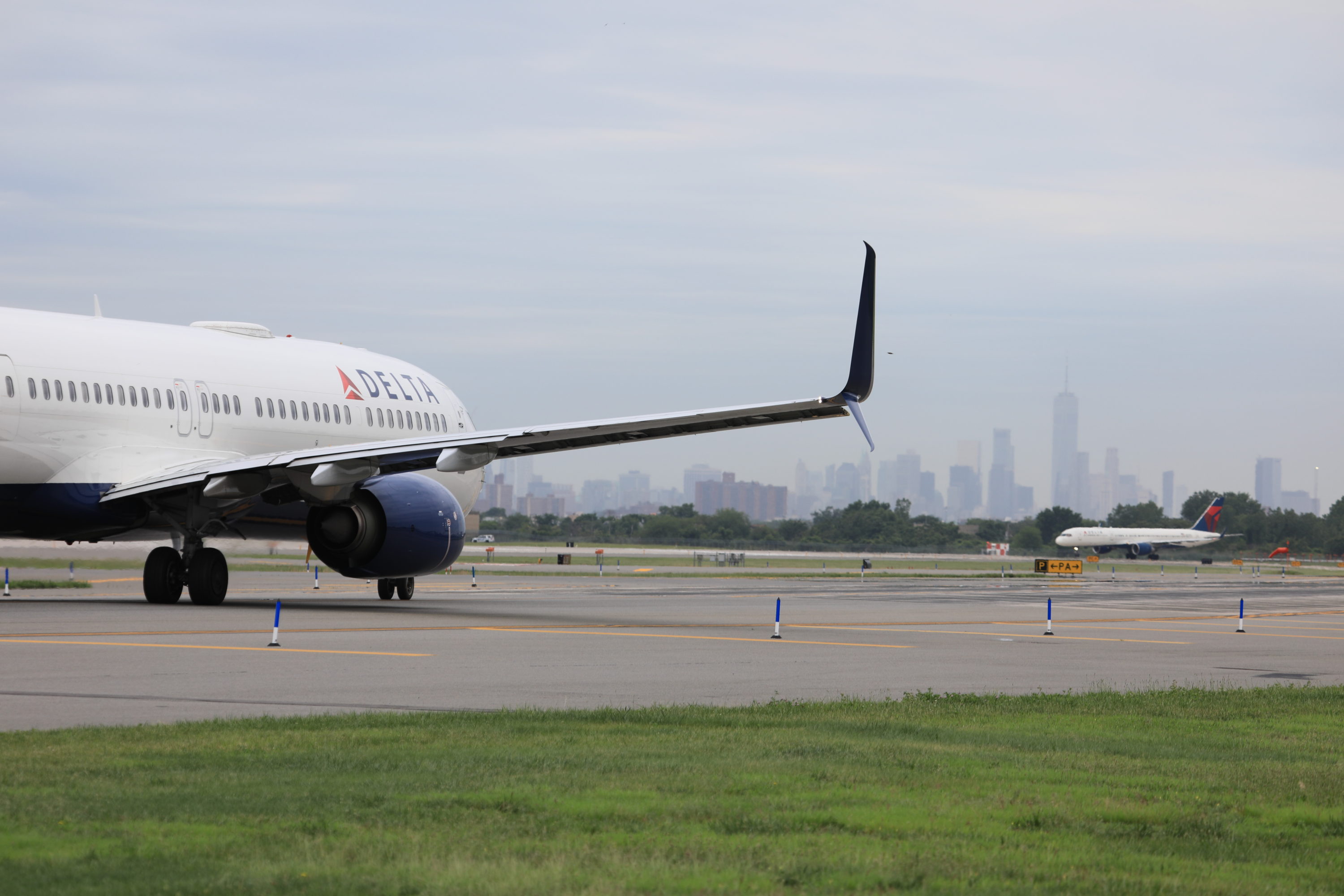 A Delta plane taxiing at JFK Airport A Delta plane taxiing at JFK Airport