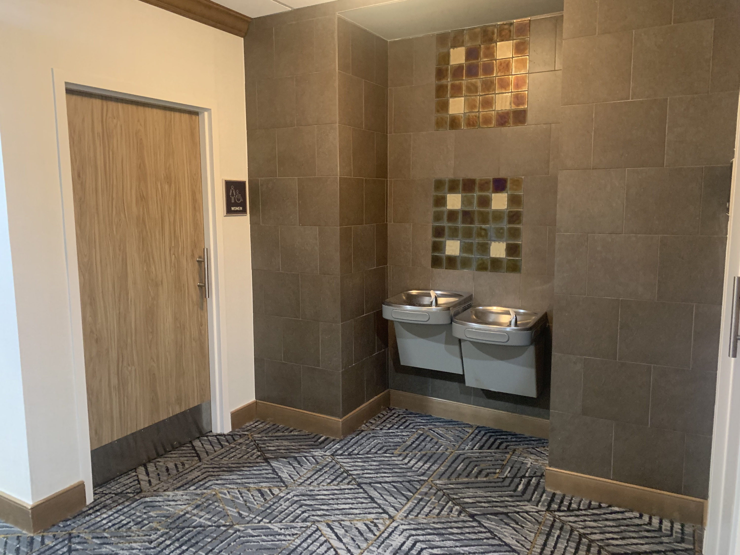 Downstairs bathroom and water fountain at Homewood Suites Austin Round Rock