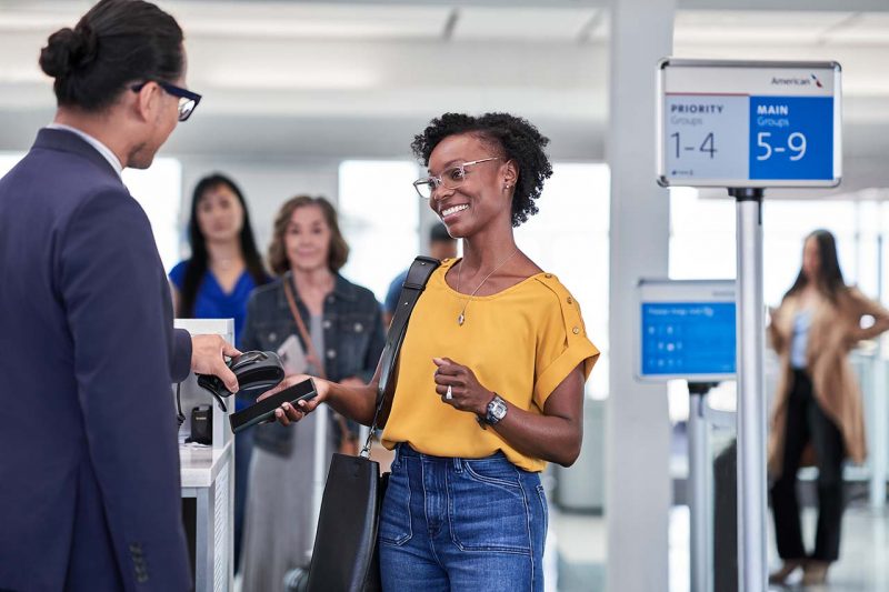 Female Passenger Priority Boarding American Airlines AA
