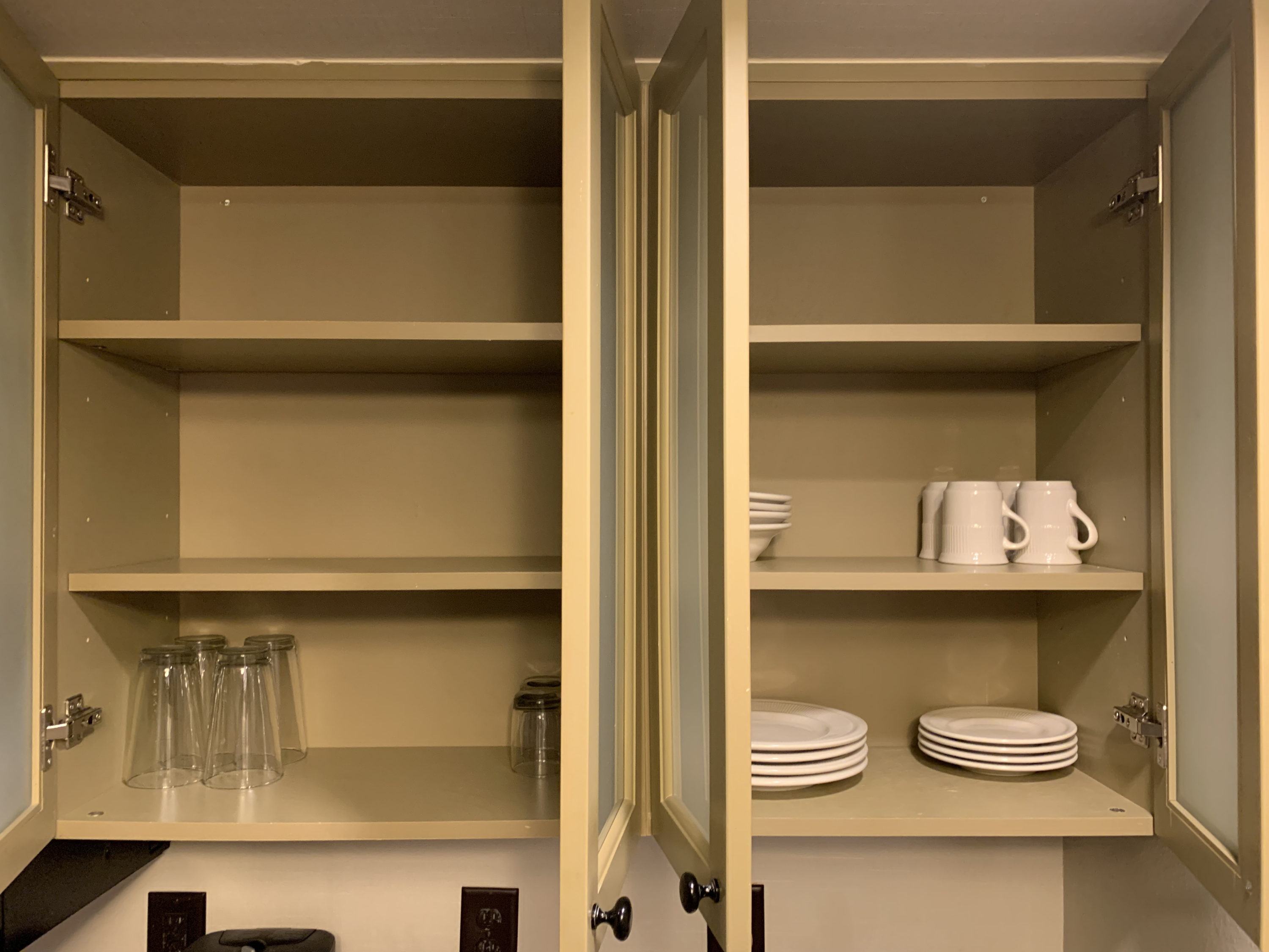 Inside the cabinets in the guestroom at Homewood Suites Austin Round Rock