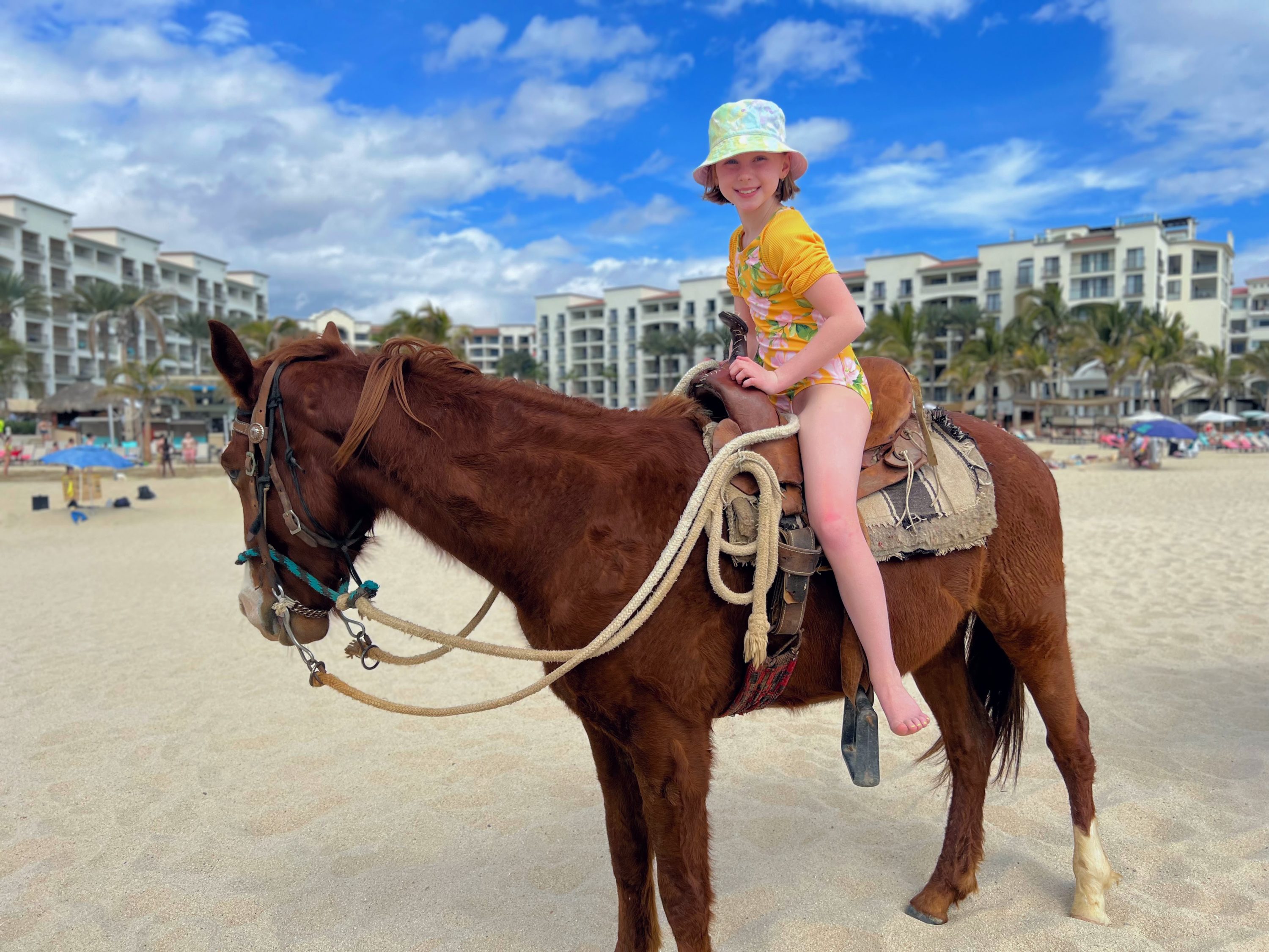 Riding a horse in front of Hyatt Ziva Los Cabos