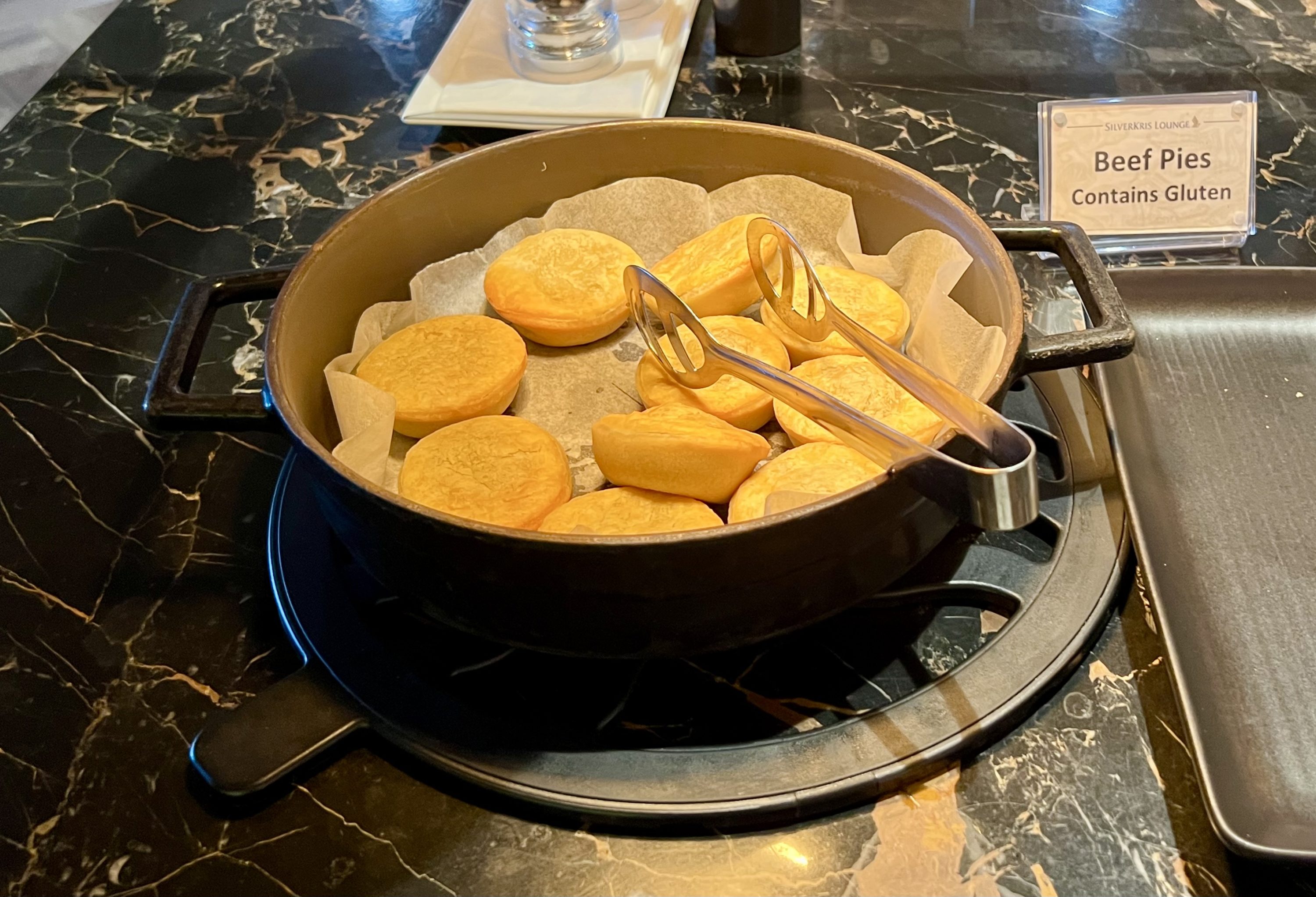 Singapore SilverKris First Class lounge at SYD FB beef pies