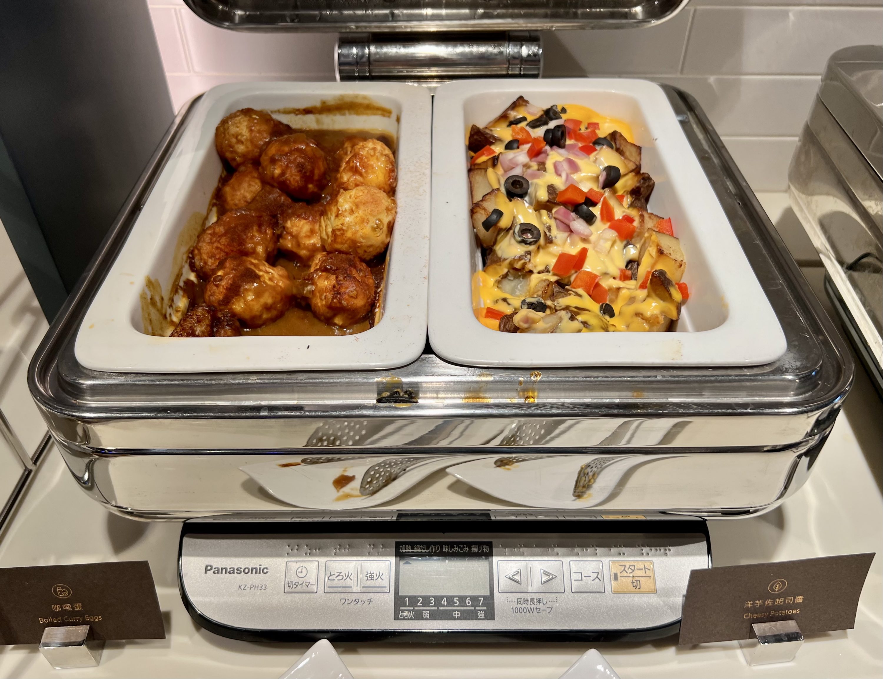 Starlux A359 Business Class TPE lounge curried eggs and cheesy potatoes