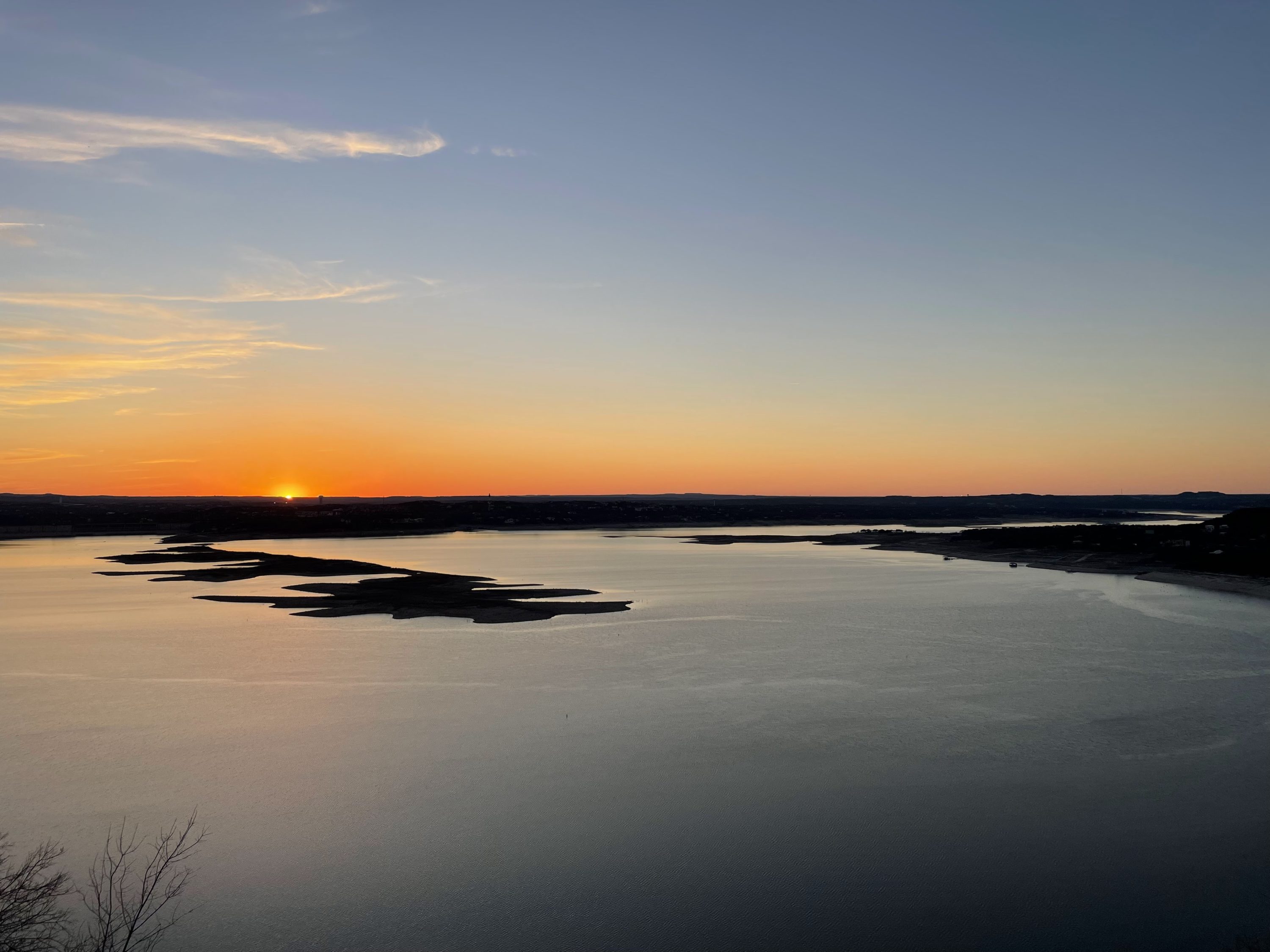 Sunset view of the lake from The Oasis Restaurant in Austin