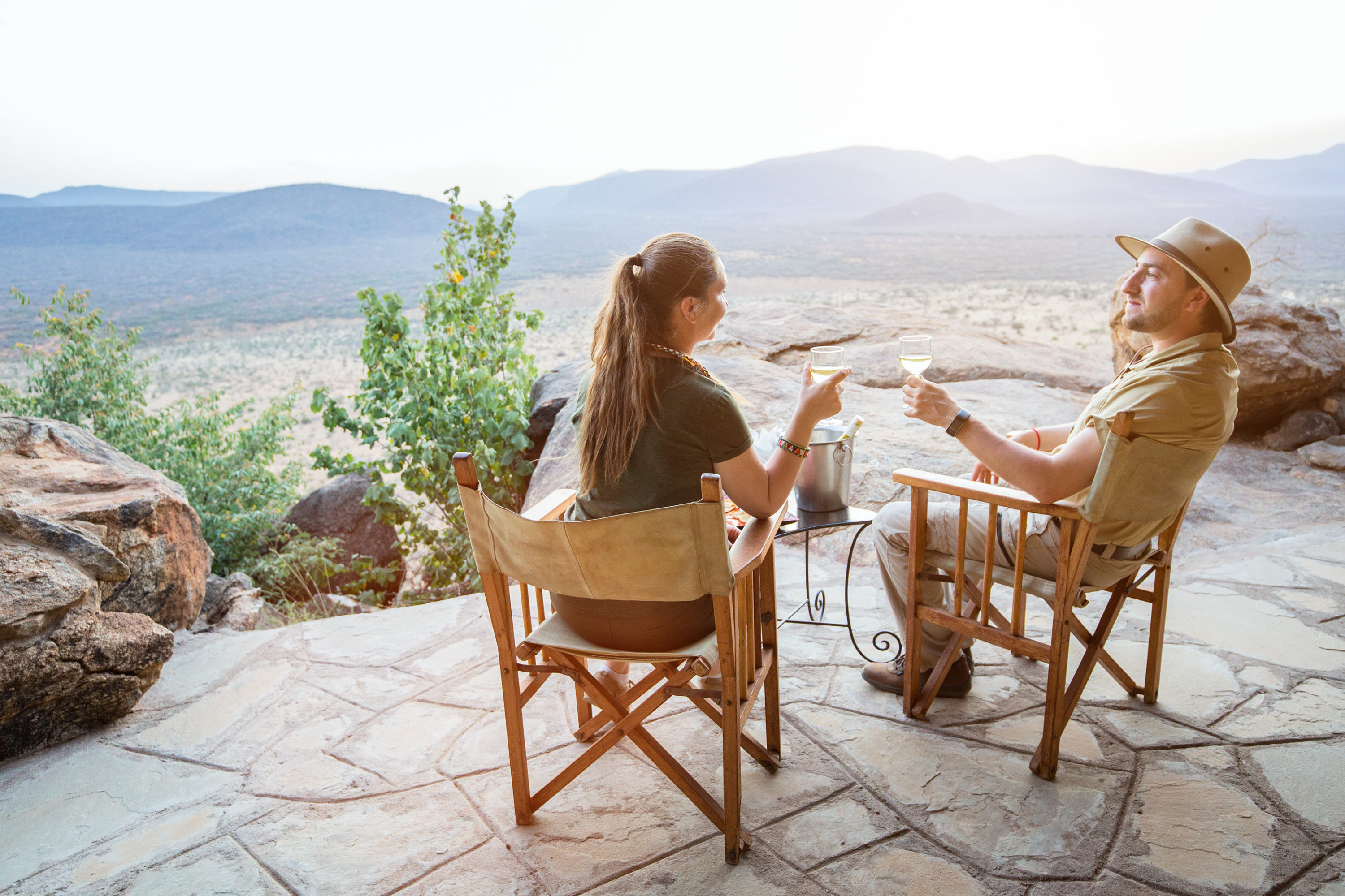 A couple toast while on safari.