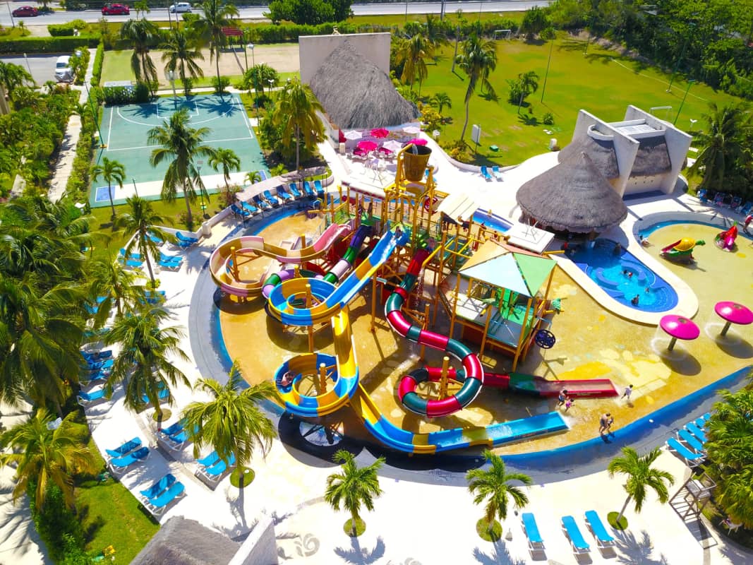 An aerial photo of the water slides at All Ritmo Cancun Resort & Waterpark. An aerial photo of the water slides at All Ritmo Cancun Resort & Waterpark.