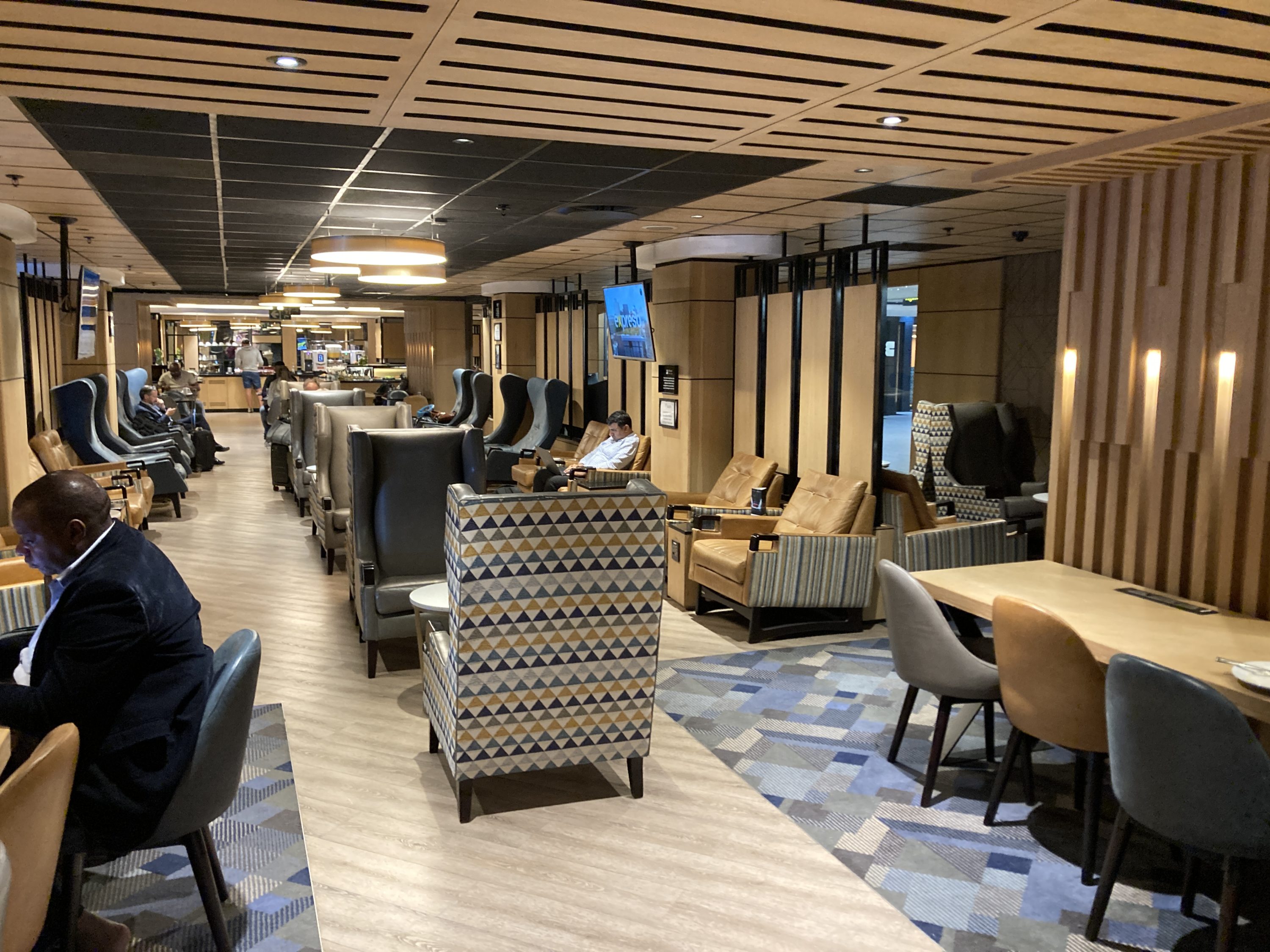 Bidvest Premier Lounge dining seating from smoking lounge