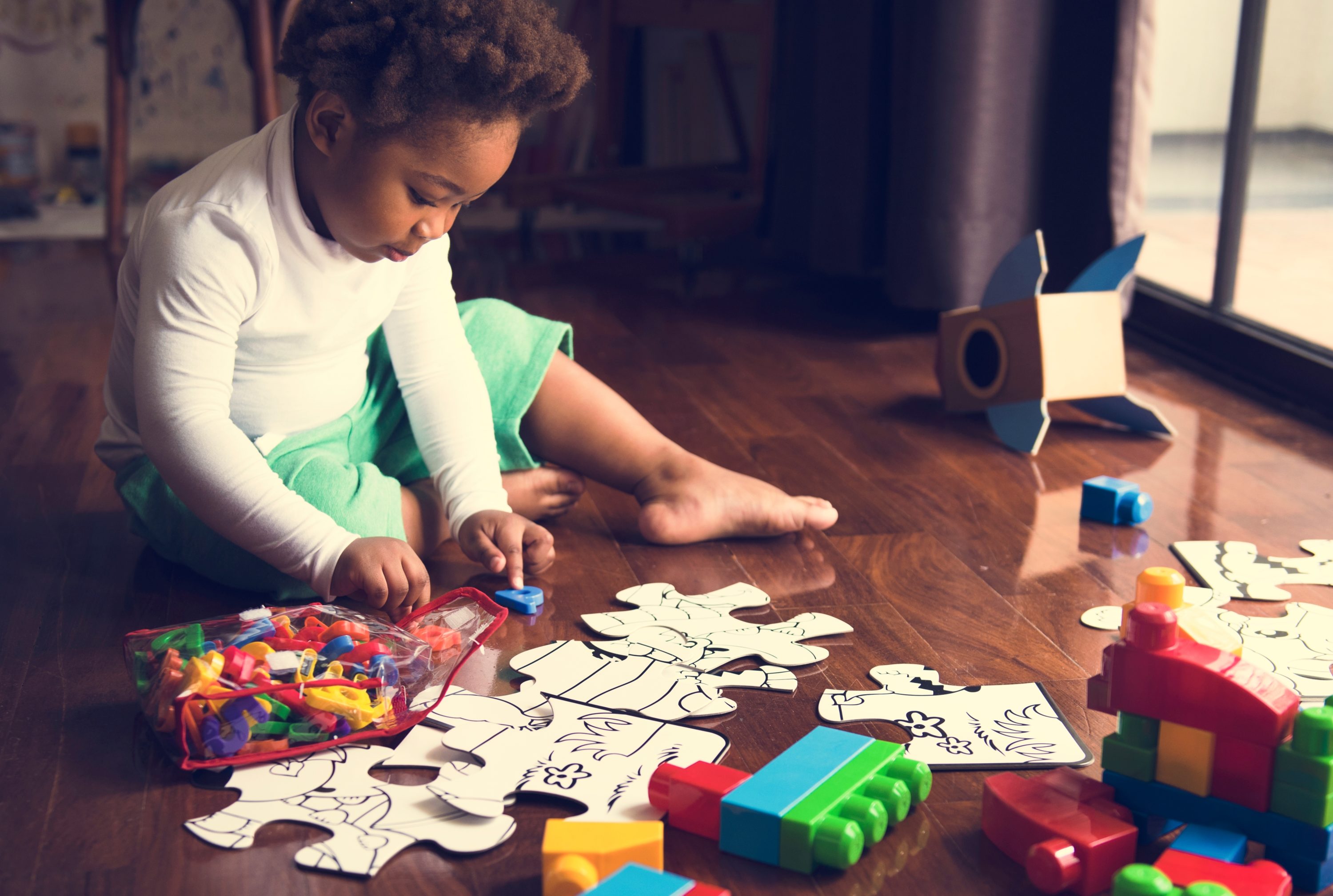 Toddler with puzzles