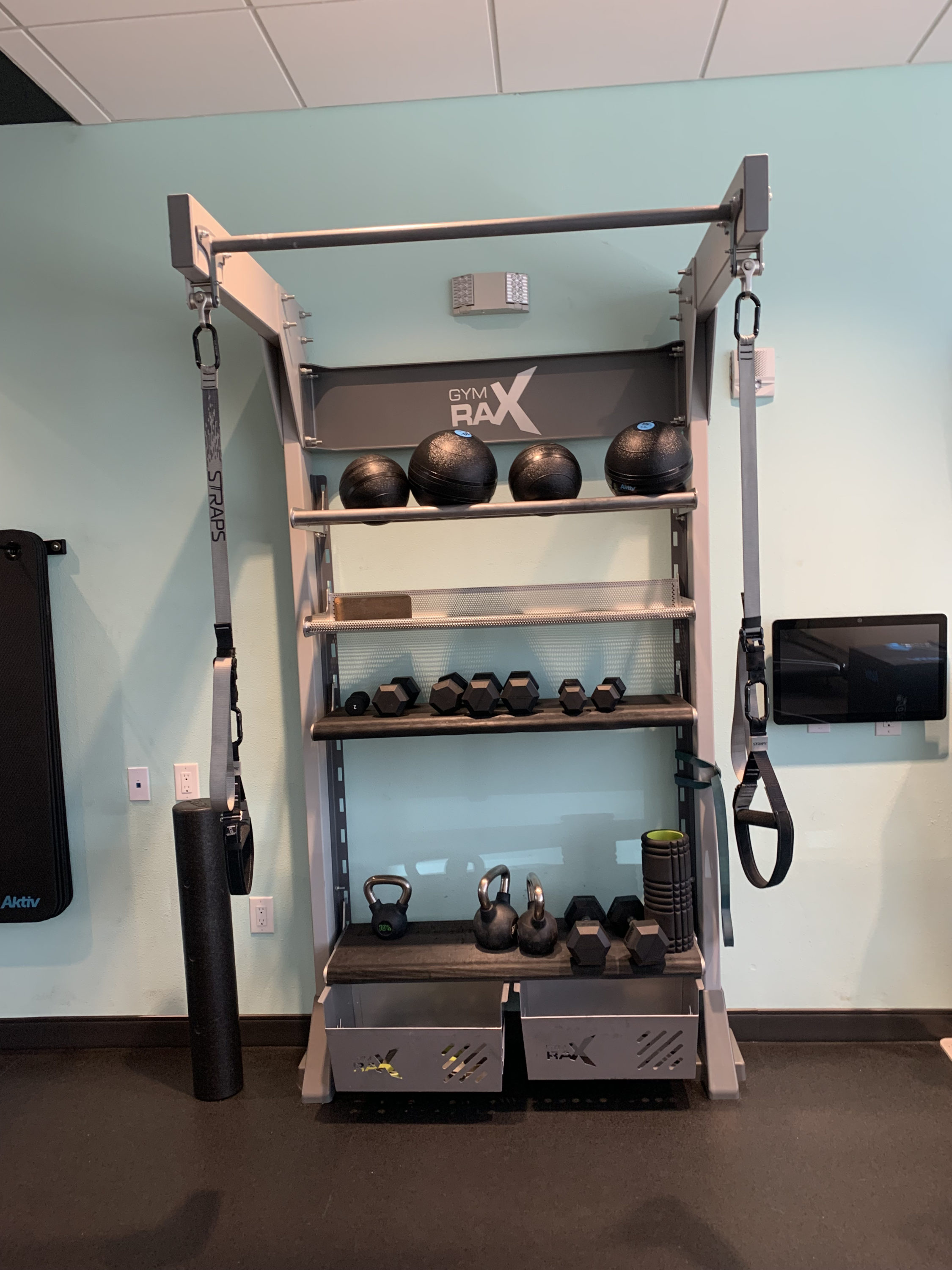 Tru by Hilton Frisco Dallas fitness center weight rack