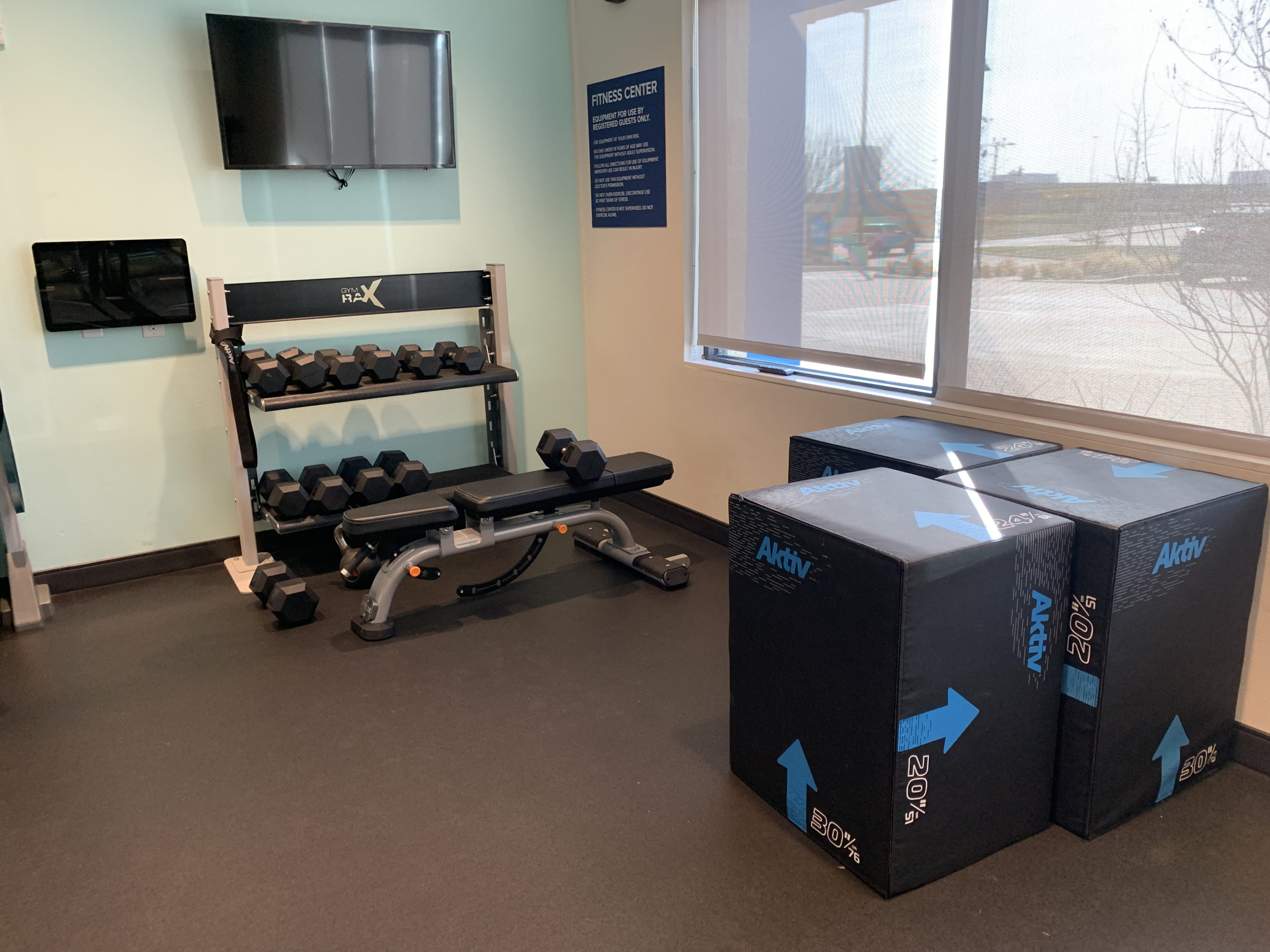 Tru by Hilton Frisco Dallas fitness center weight racks