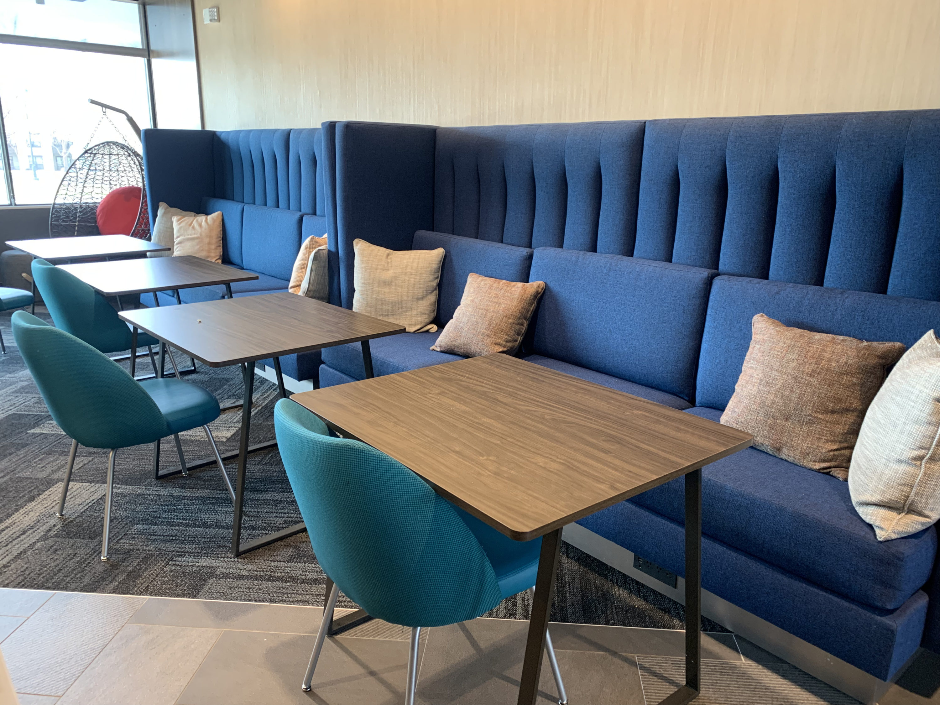 Tru by Hilton Frisco Dallas lobby table seating