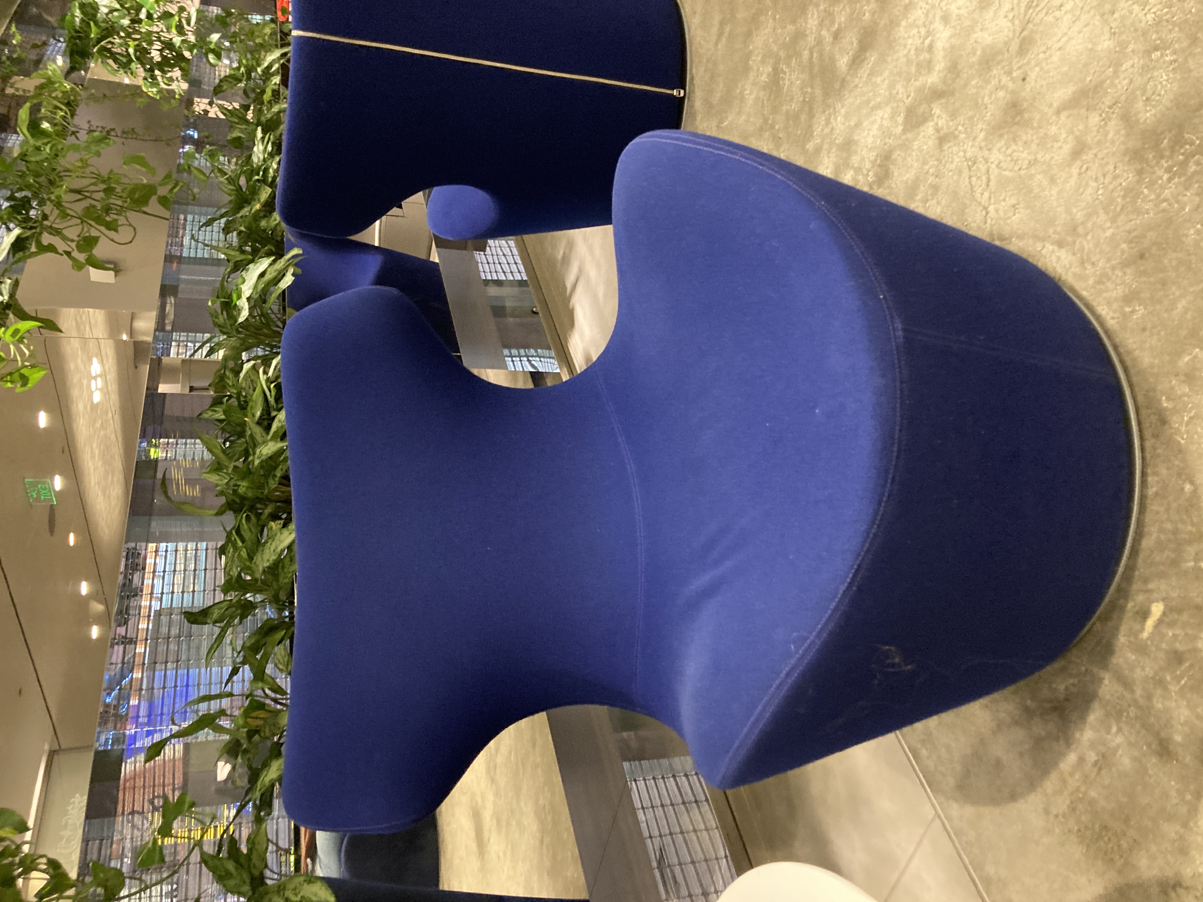 Al Maha Lounge Doha main blue seating Al Maha Lounge Doha main blue seating