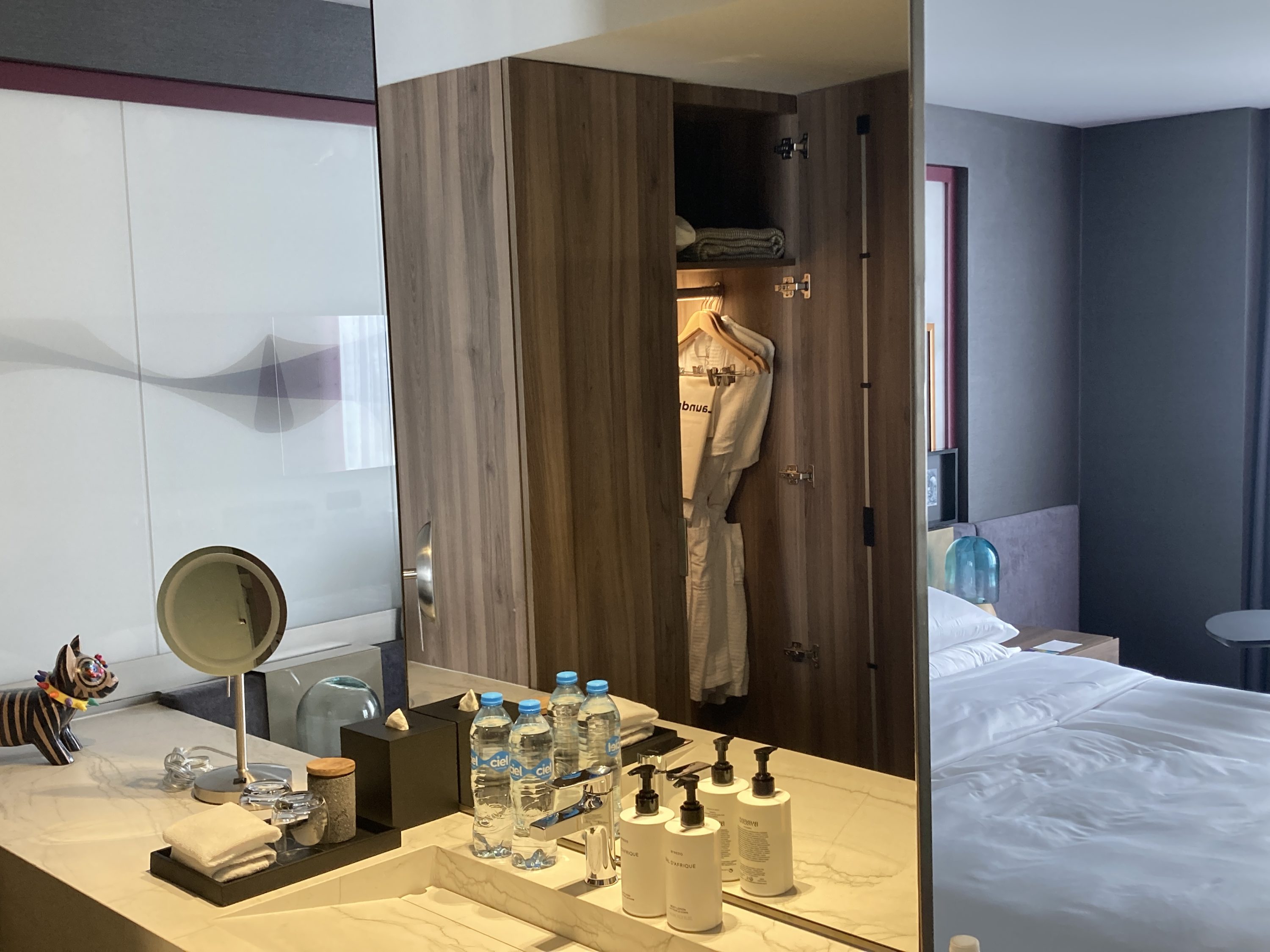 Andaz Mexico City Condesa vanity with bed in background Andaz Mexico City Condesa vanity with bed in background