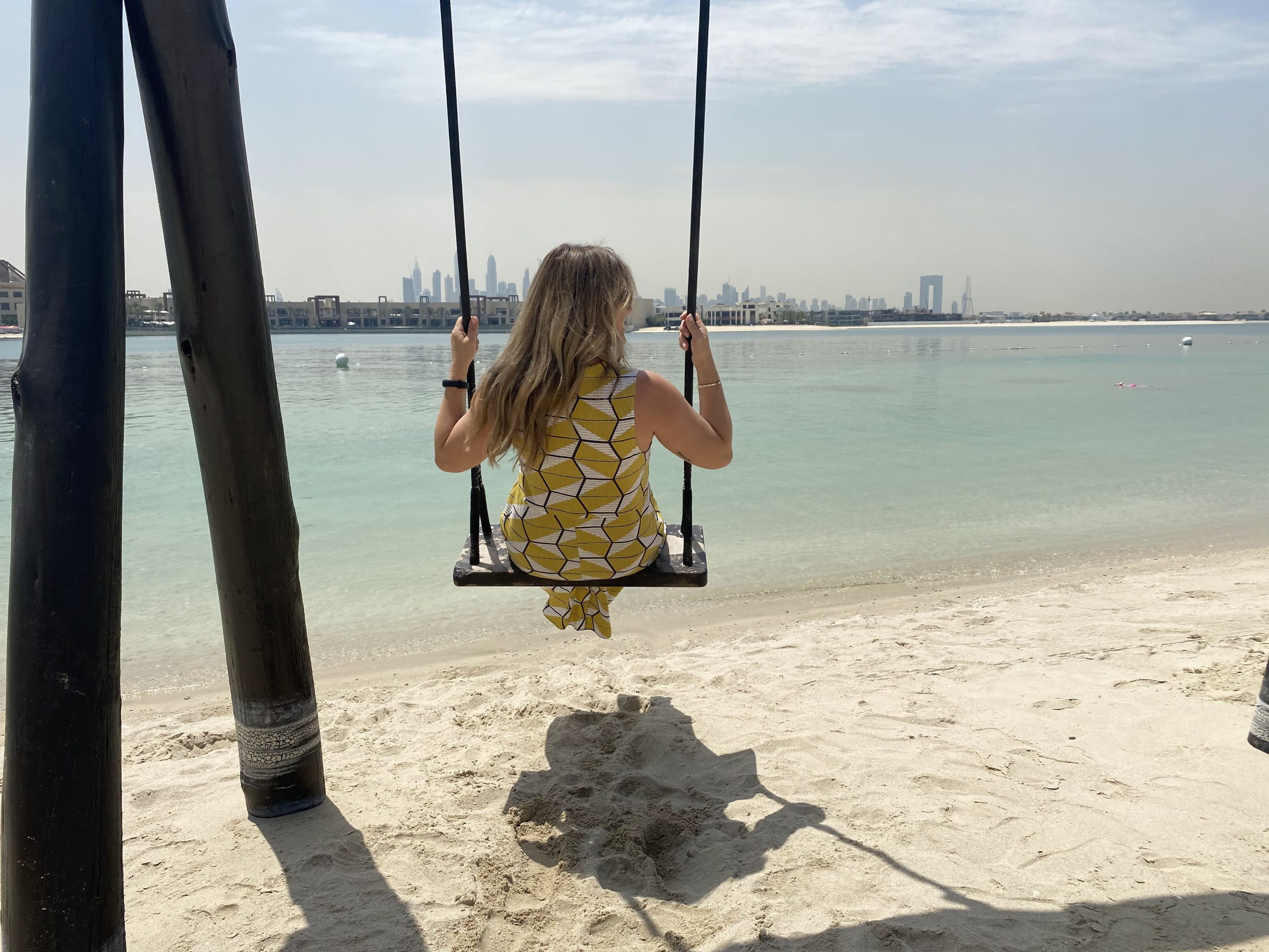 Swinging on the beach