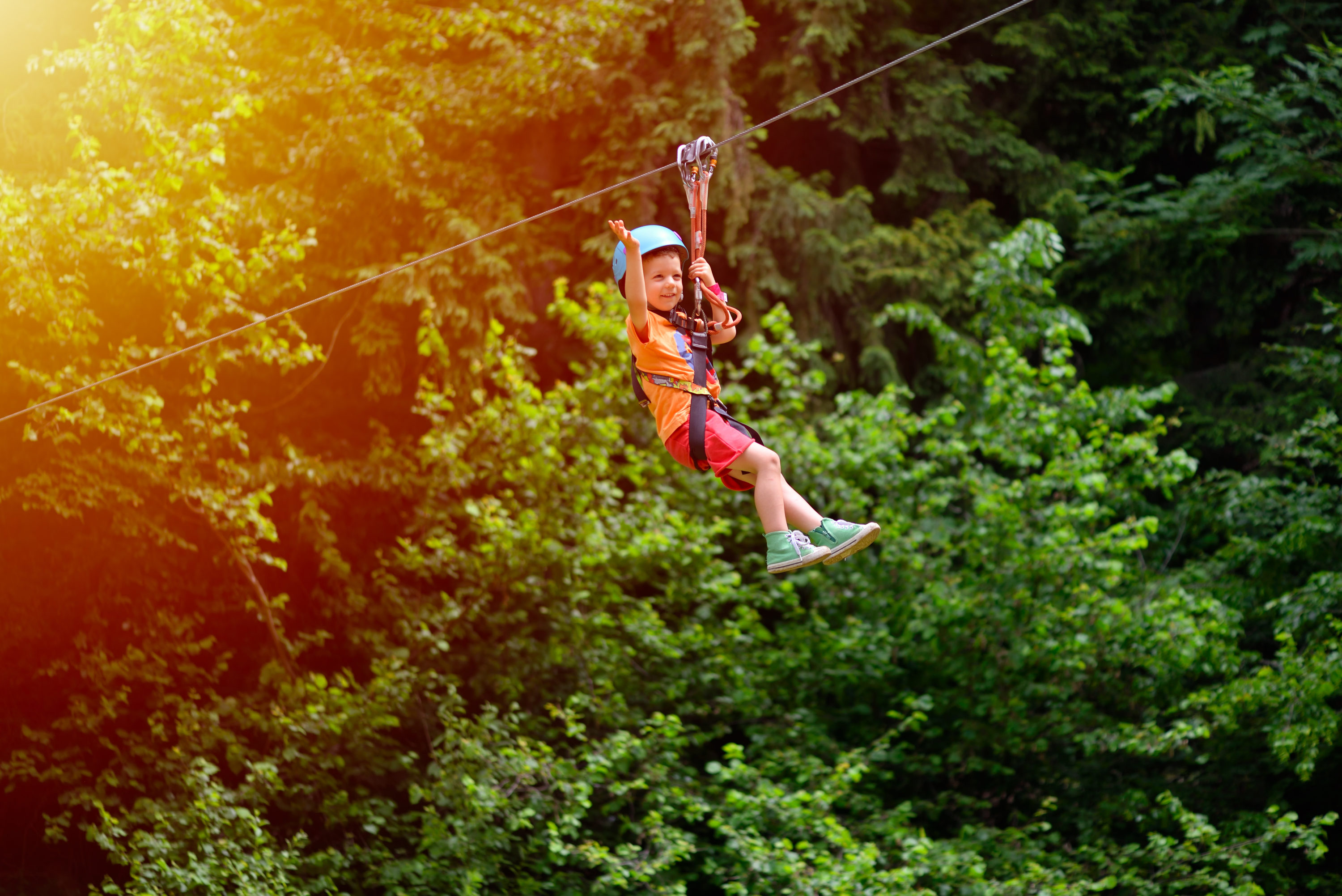 Boy ziplining
