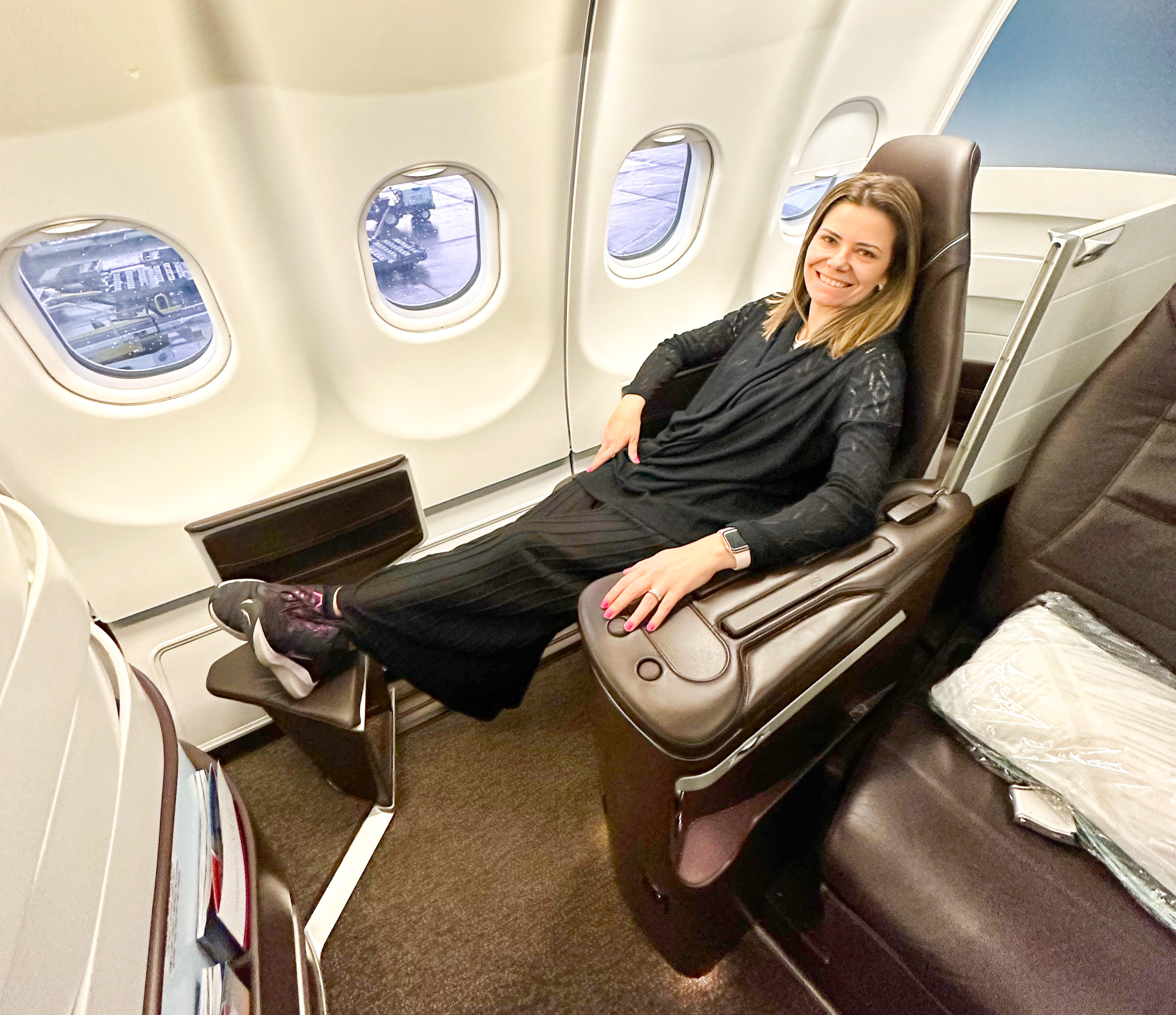 Hawaiian Airlines First Class woman Hawaiian Airlines First Class woman