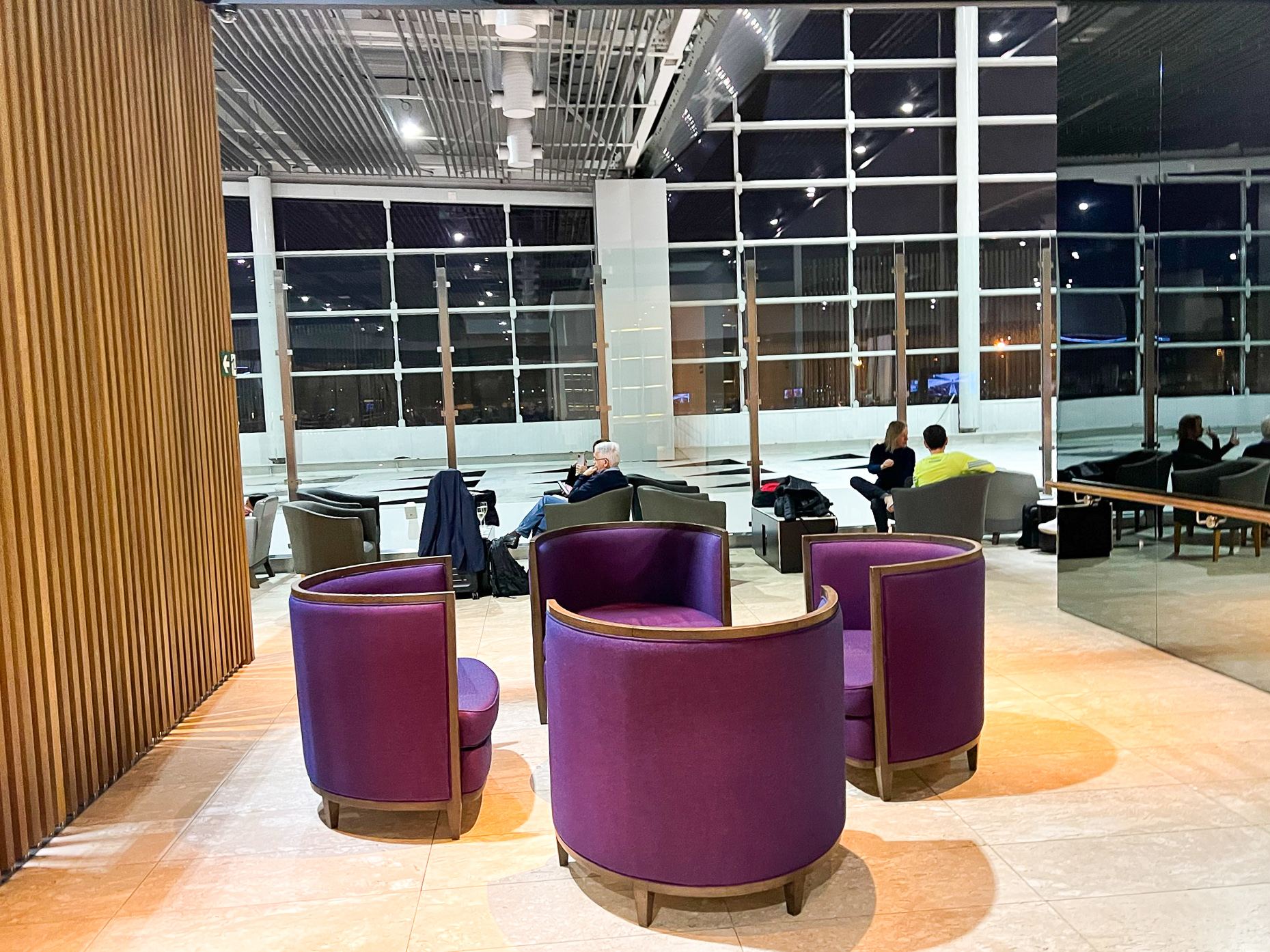 Purple chairs at LATAM VIP Lounge GRU Purple chairs at LATAM VIP Lounge GRU