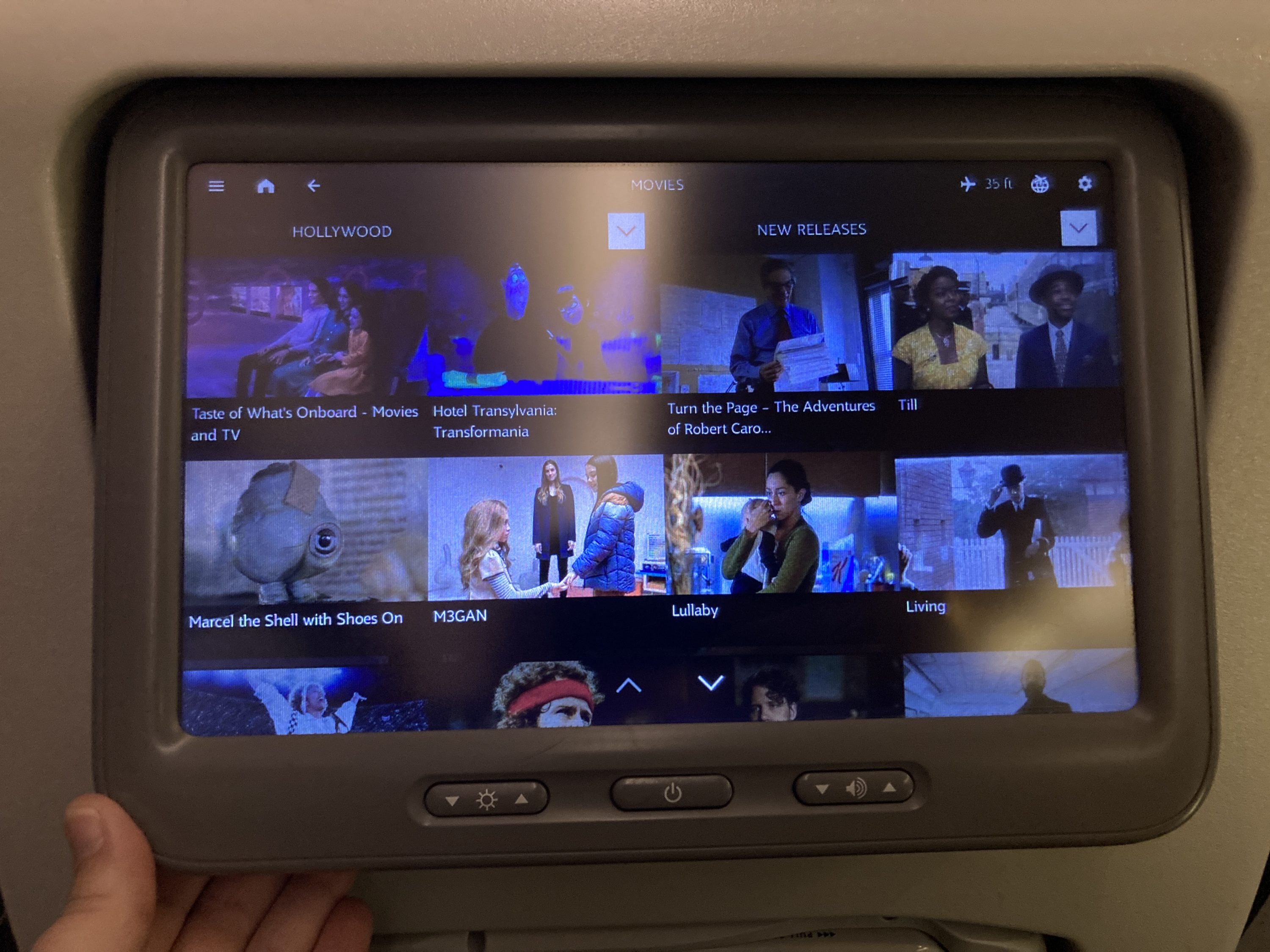 Qatar Airways 777 DOH DFW economy IFE screen adjustment