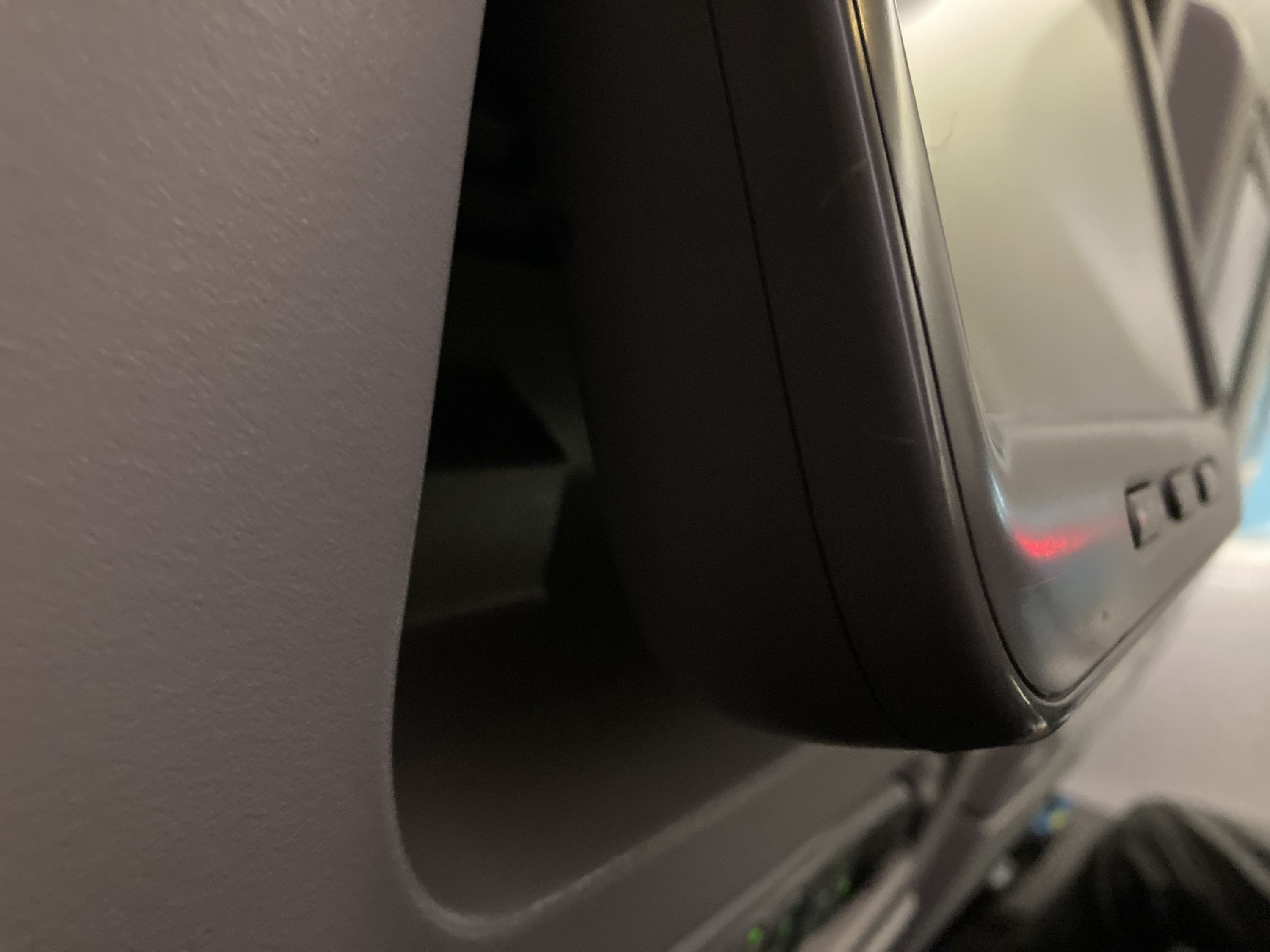 Qatar Airways 777 DOH DFW economy IFE screen tilt