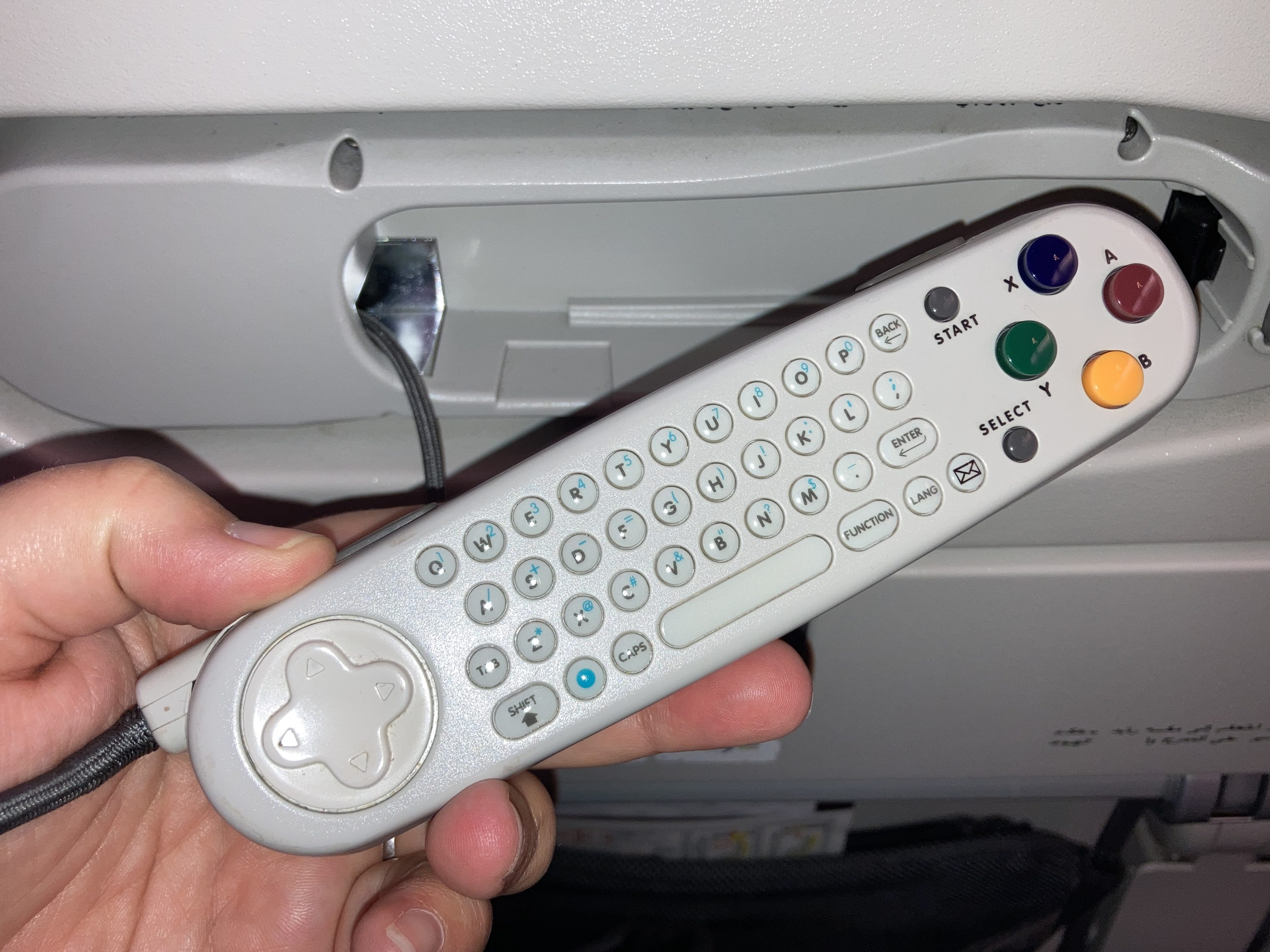 Qatar Airways 777 DOH DFW economy remote