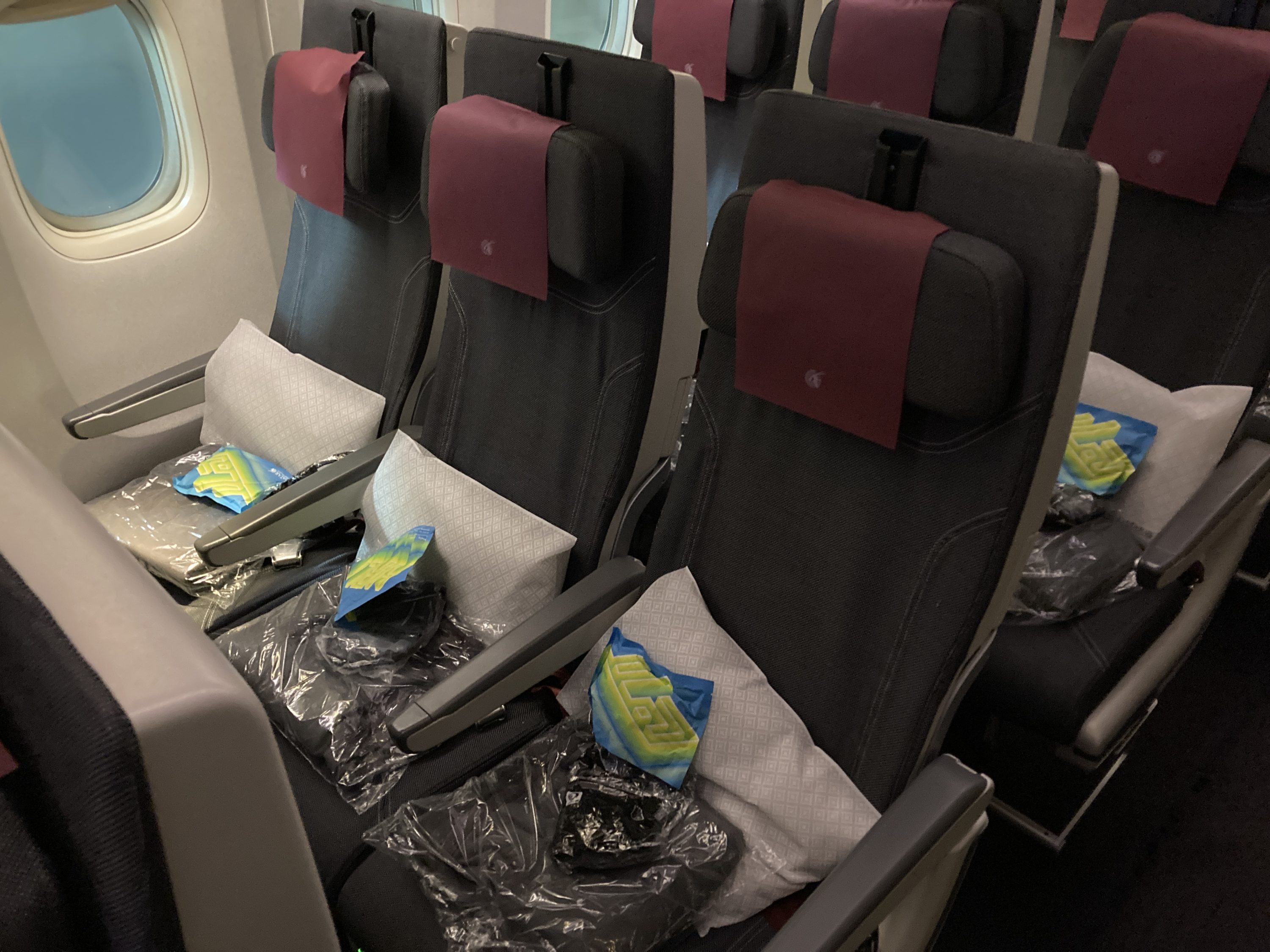 Qatar Airways 777 DOH DFW economy row 22